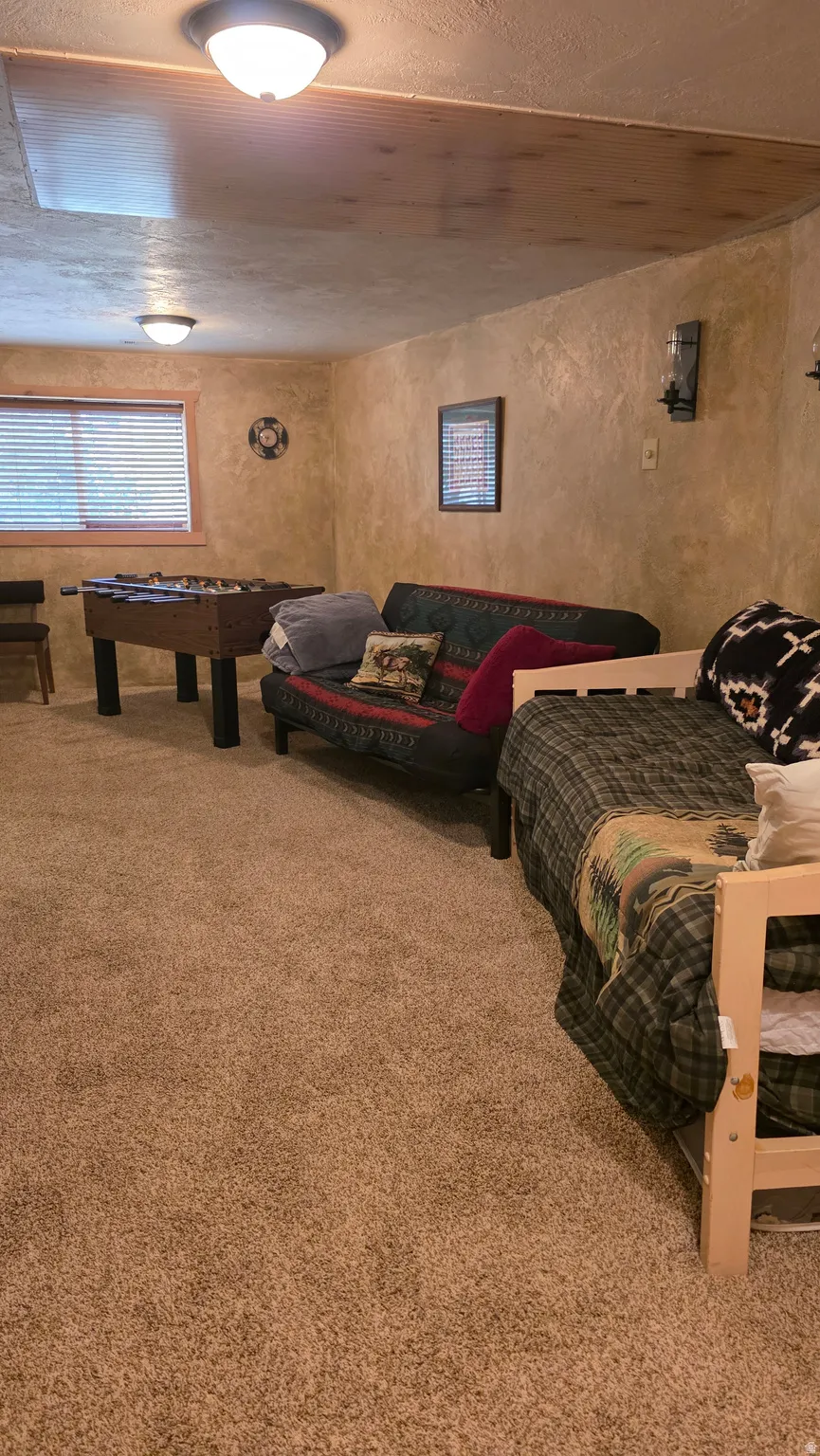 Bedroom featuring carpet floors