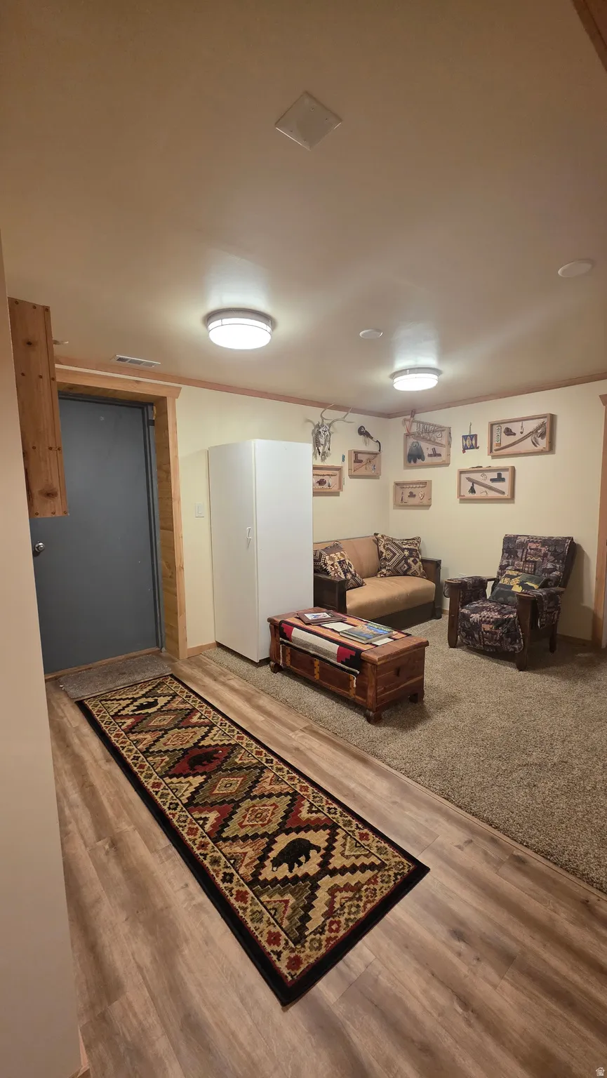 Living room featuring light wood-style floors