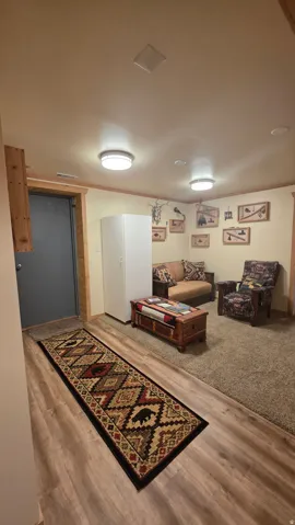 Living room featuring light wood-style floors