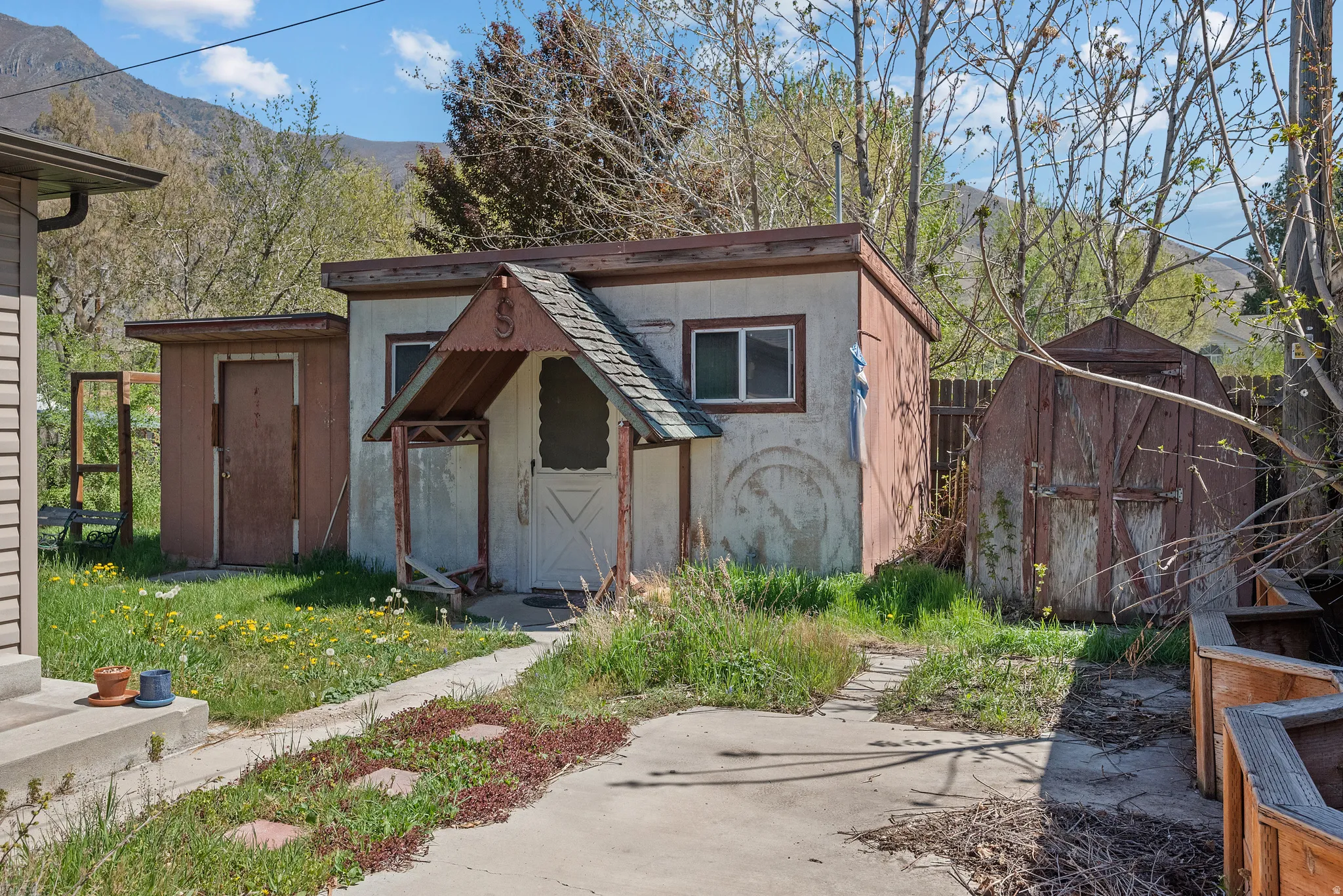 View of shed with a mountain view