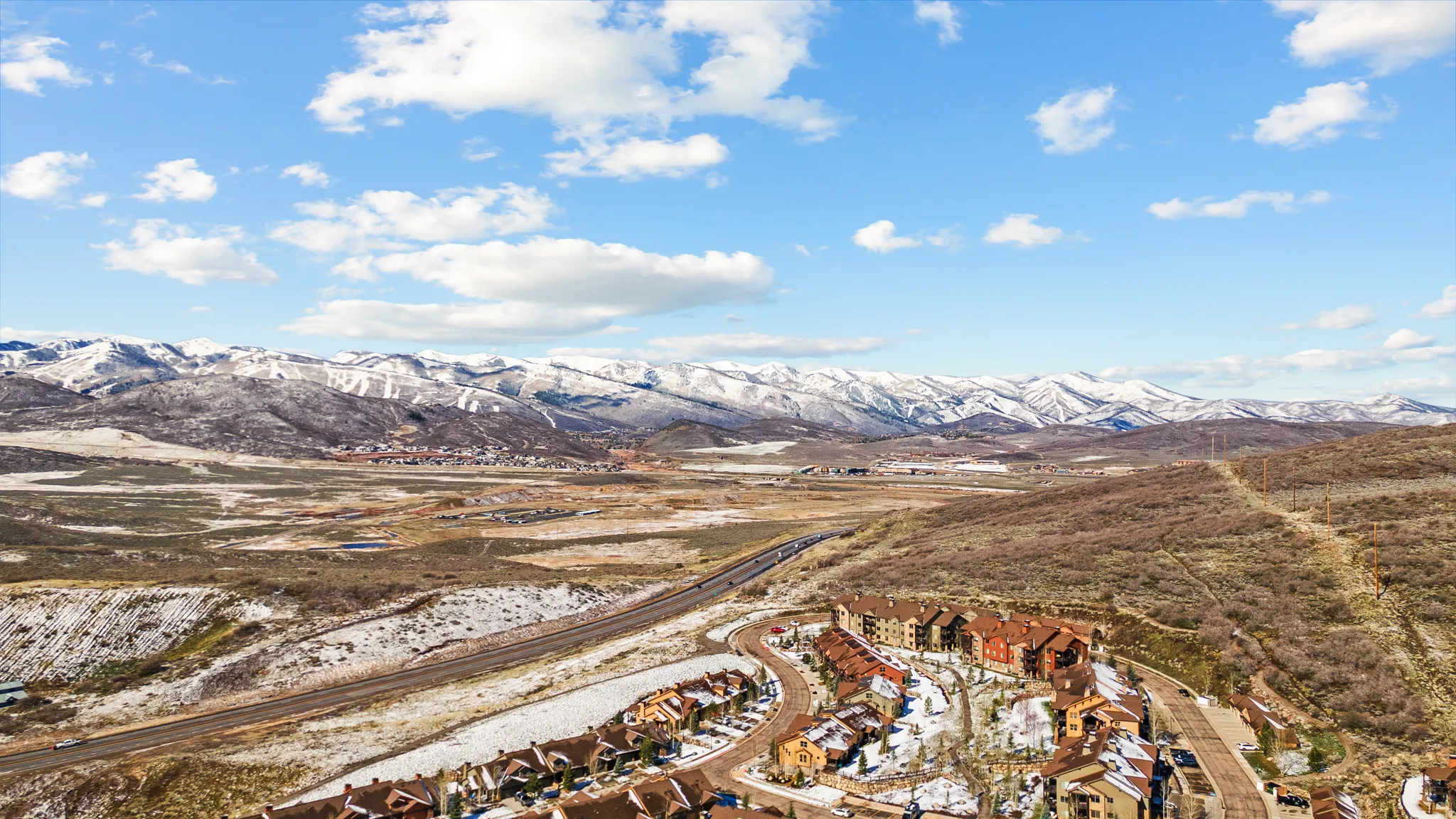 Drone / aerial view of a mountainous background