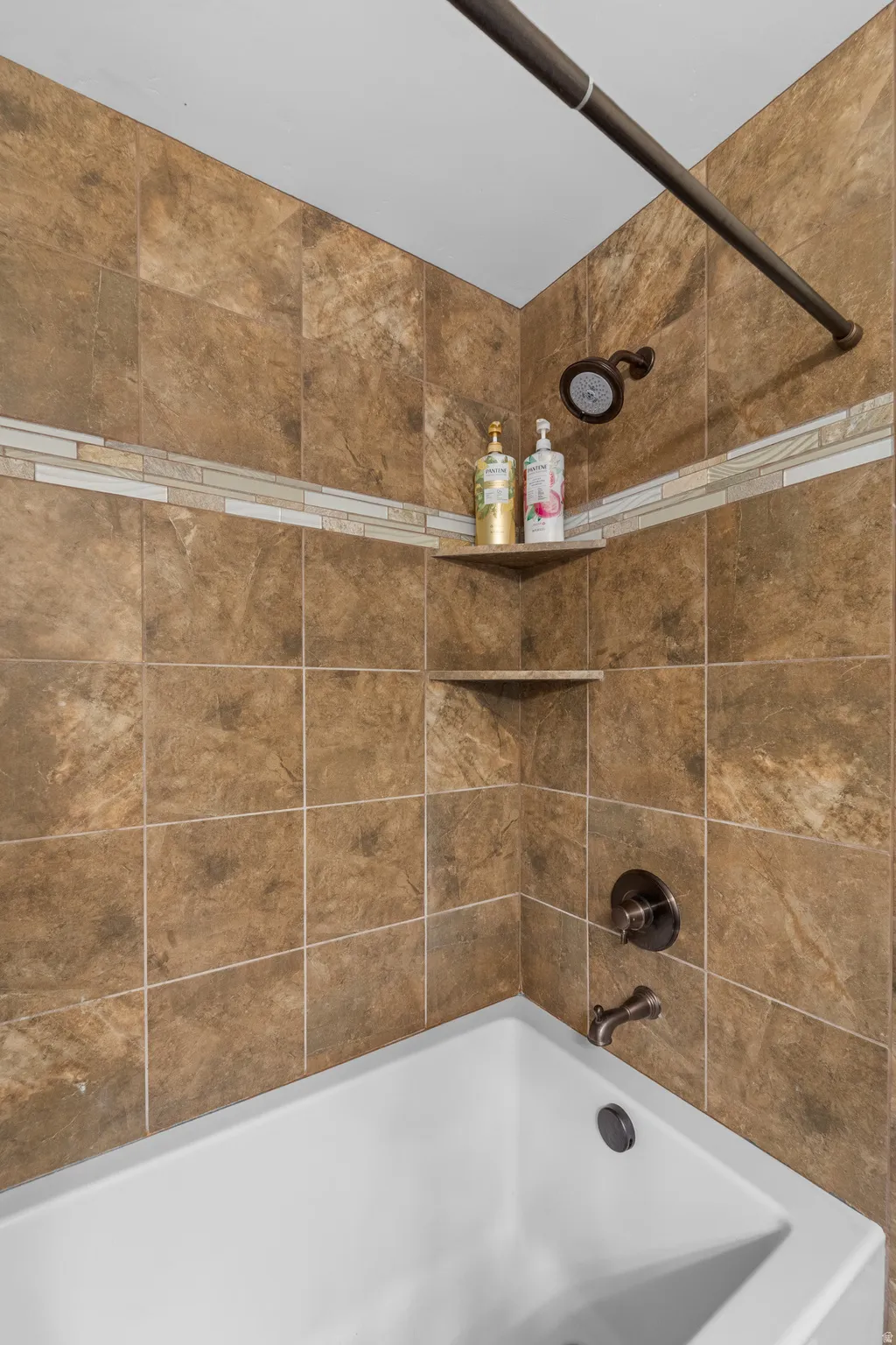 Full bathroom with  shower combination