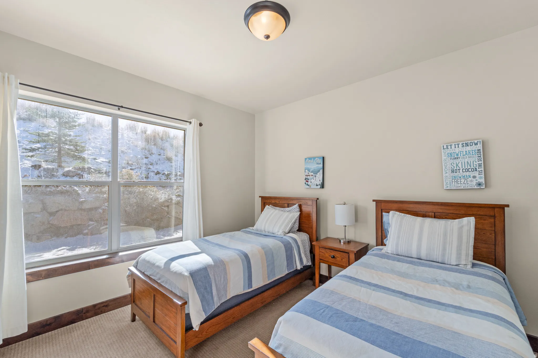 Carpeted bedroom with baseboards