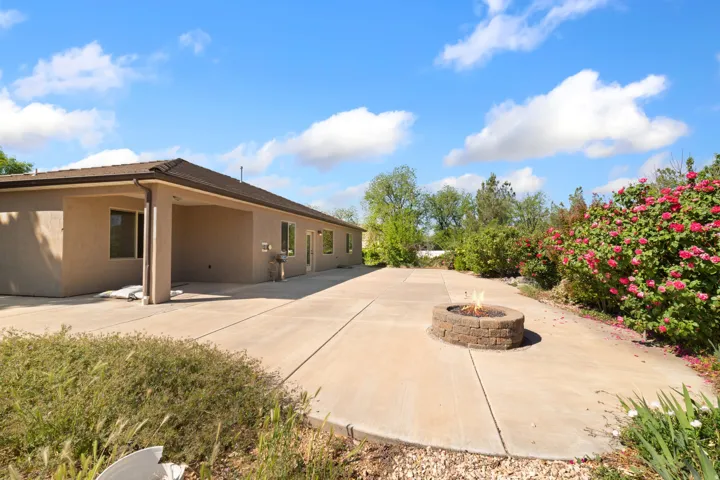 View of patio featuring a fire pit