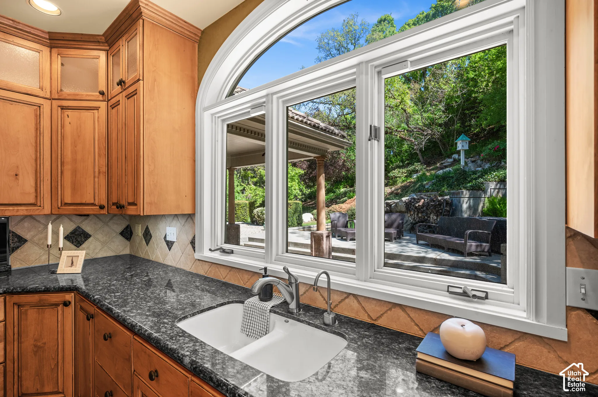 Kitchen window looking at fish pond and waterfall.