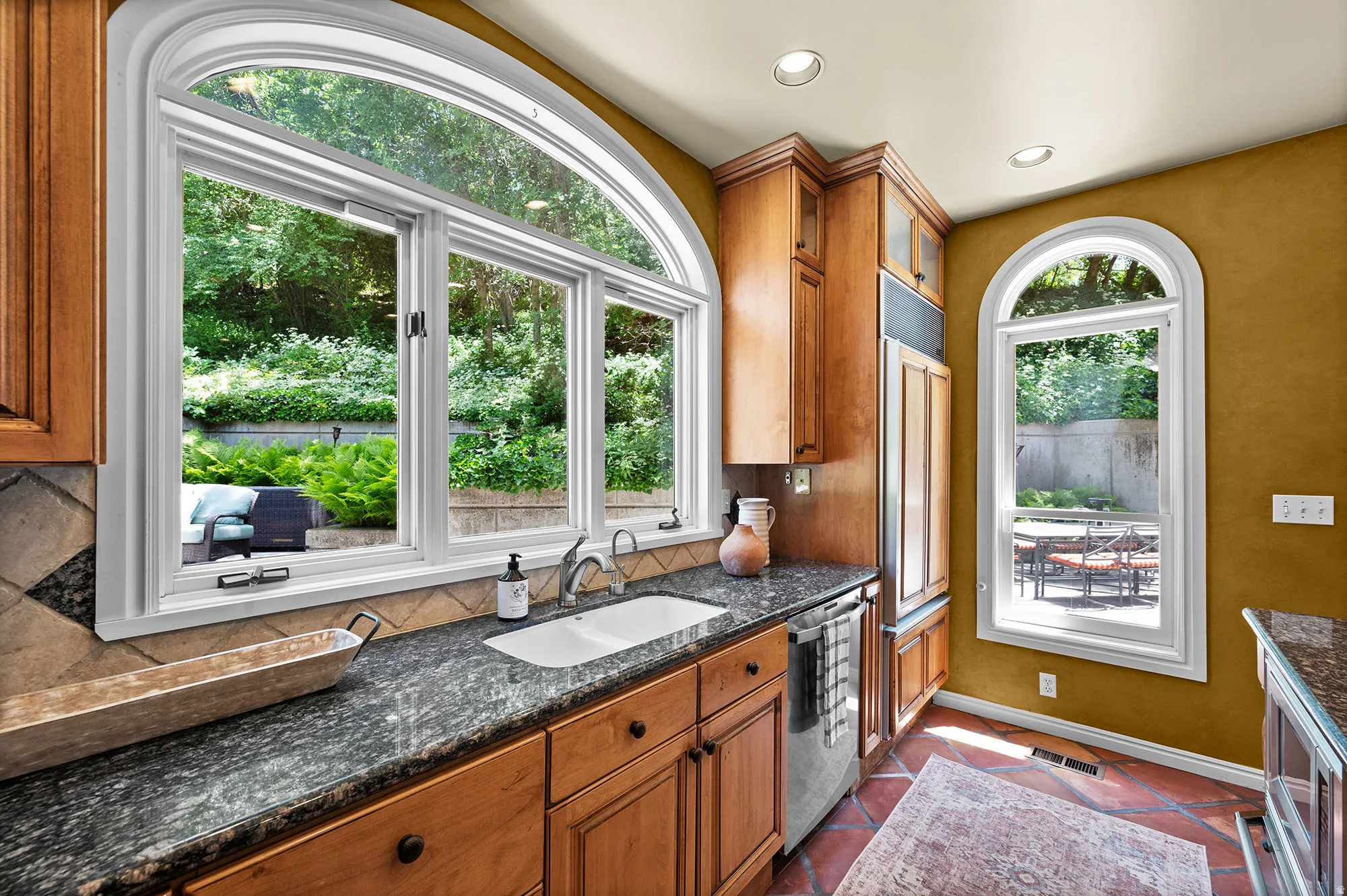 Kitchen featuring lots of windows and great natural light.