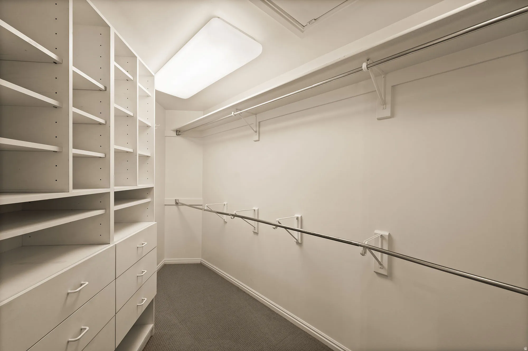Walk in closet for Primary bedroom.