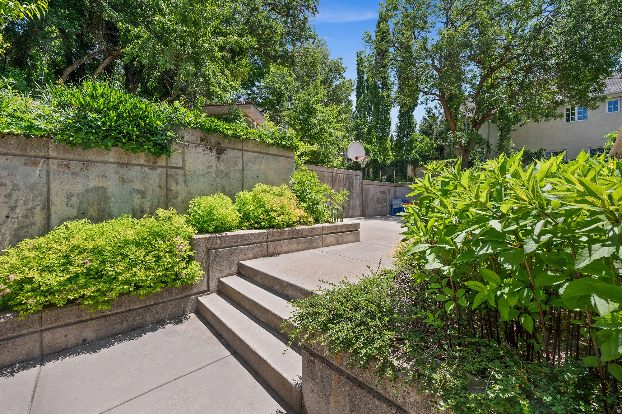 Stairs on back of property going up to upper gardens.