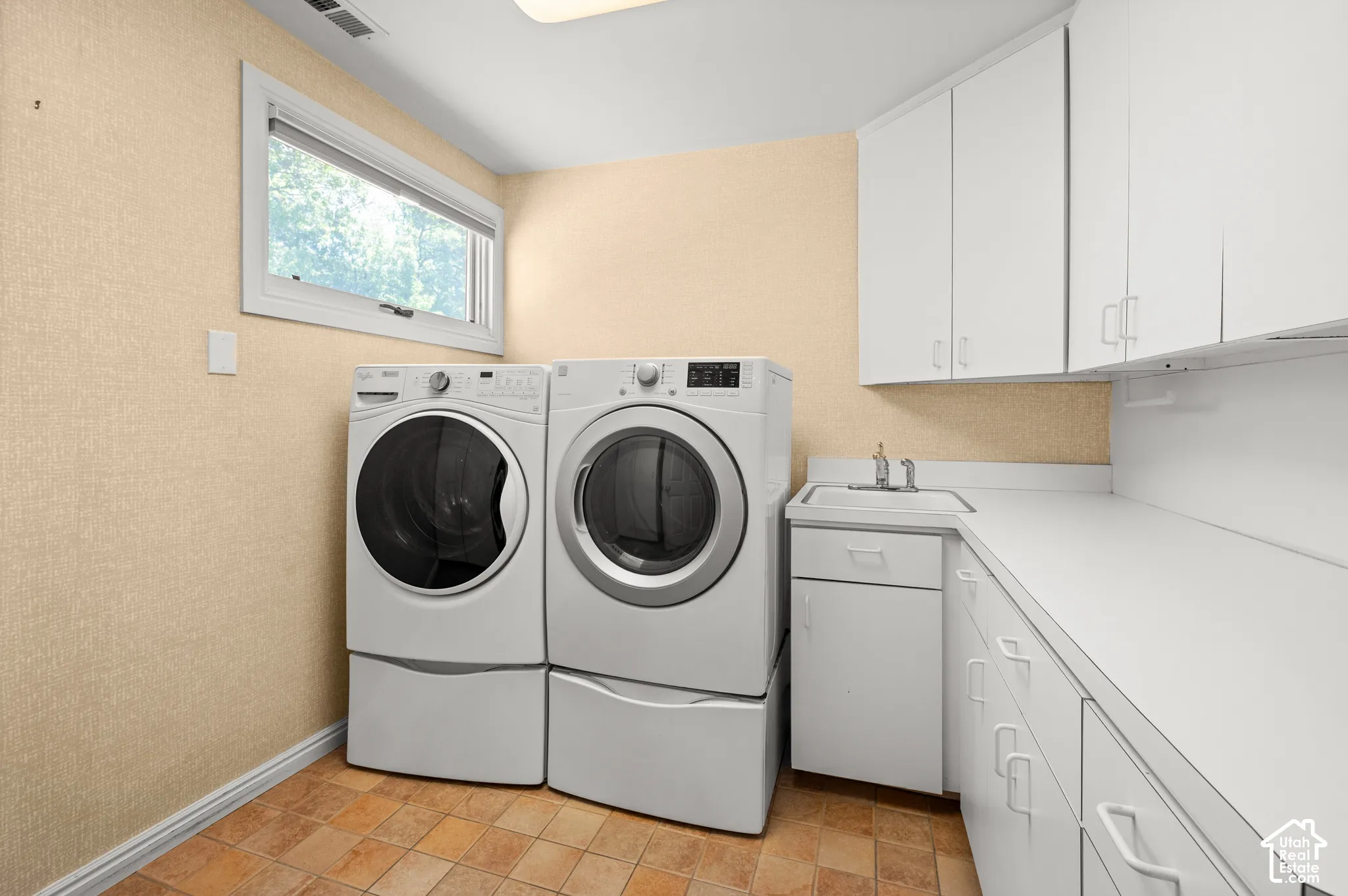 Upper level laundry and storage.