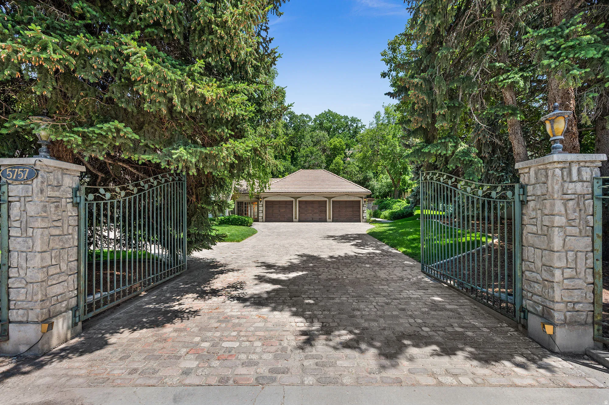 View of gates and large driveway.