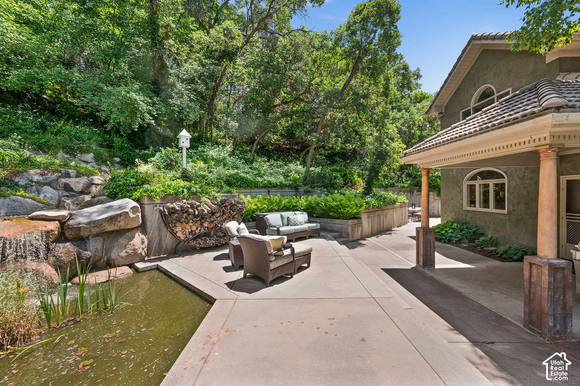 Patio, waterfall and fish pond