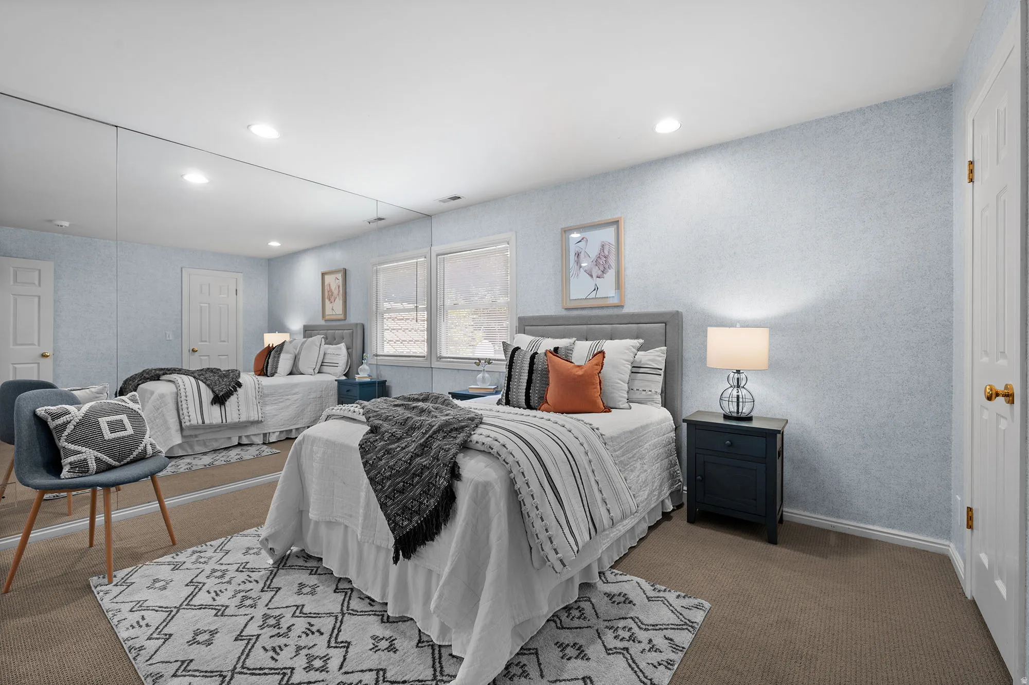 Mirrored wall in upper bedroom.