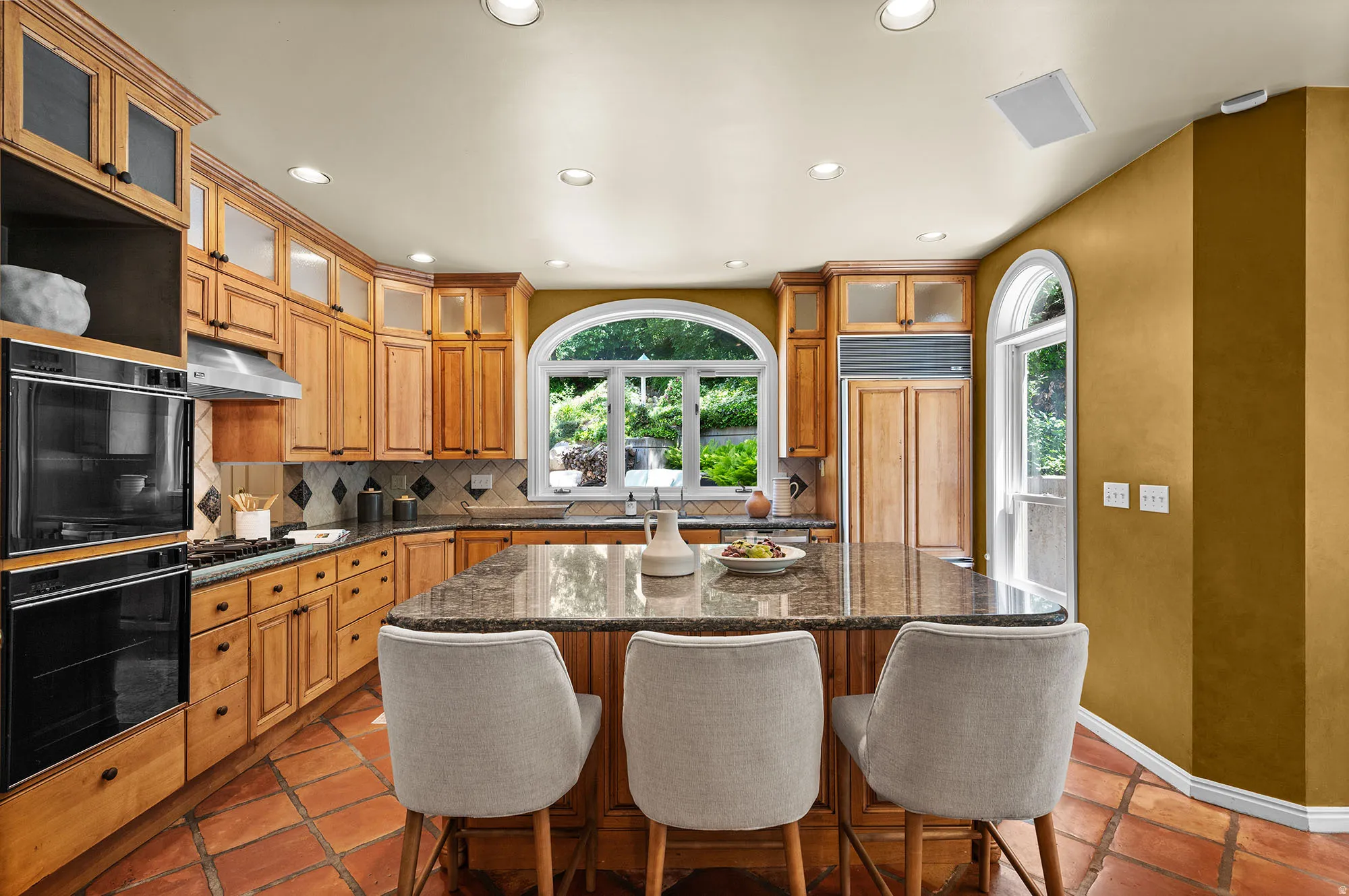 Kitchen featuring island seating.