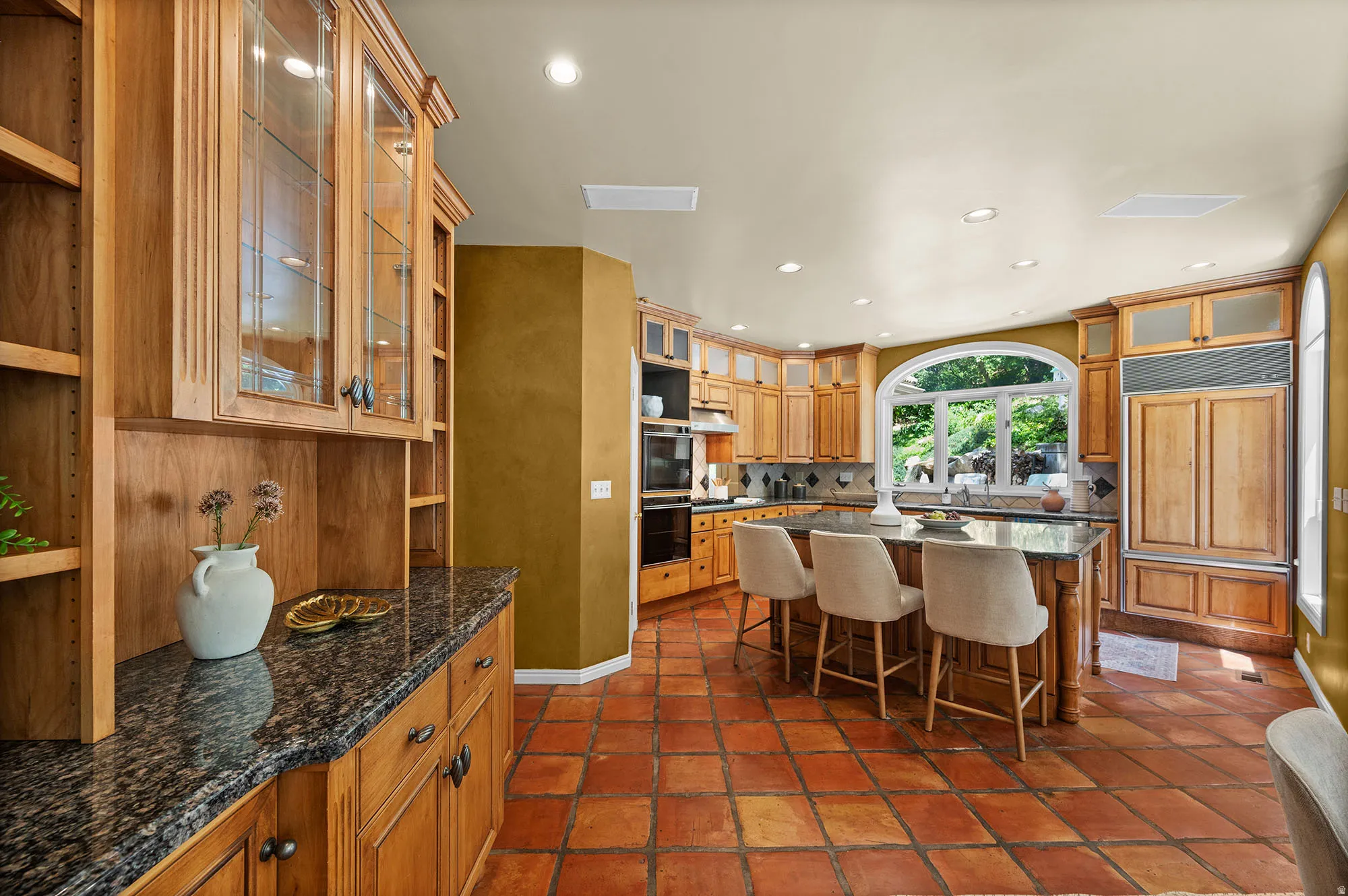 Kitchen with extra cabinets, and storage,  and a kitchen island.