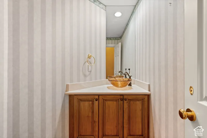 1/2 Bath near kitchen and back door to pool.