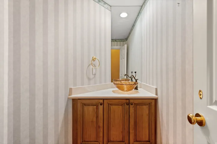 1/2 Bath near kitchen and back door to pool.