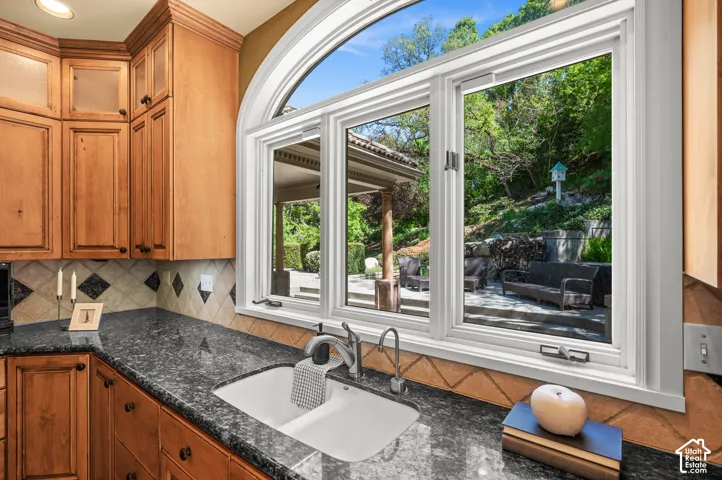 Kitchen window looking at fish pond and waterfall.