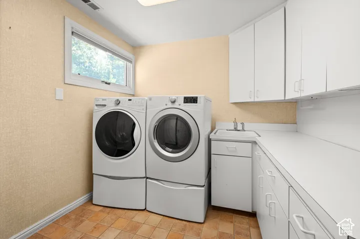 Upper level laundry and storage.