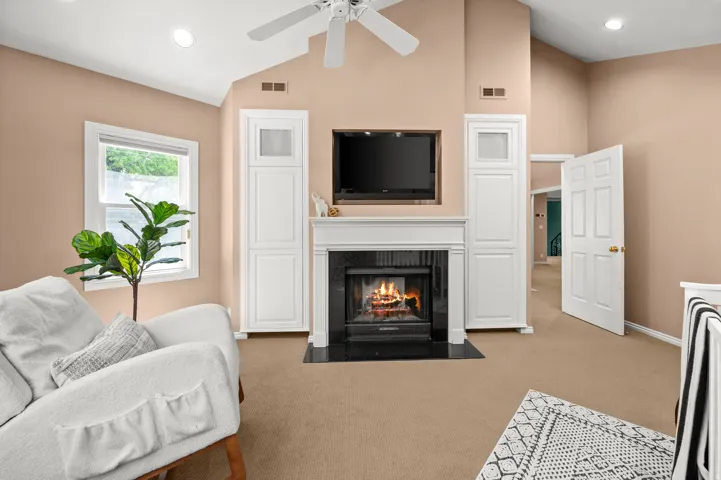 Sitting room off primary with fireplace