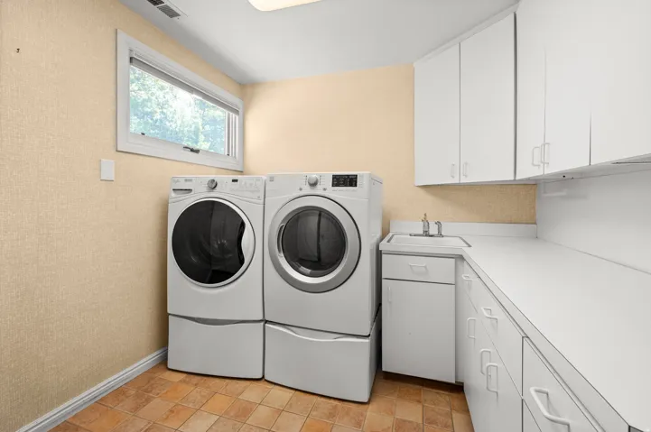 Upper level laundry and storage.