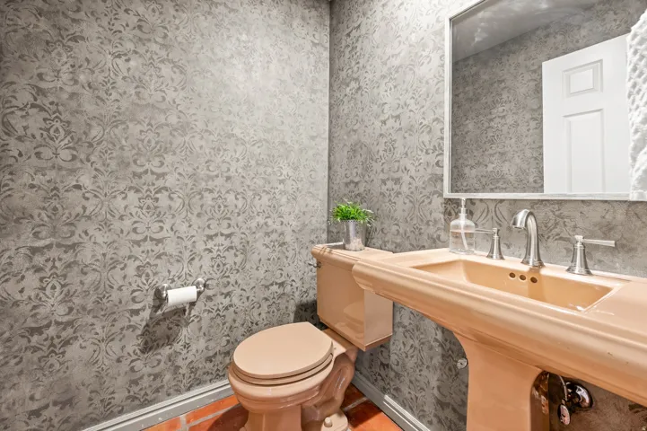 1/2 Bath off family room and office.