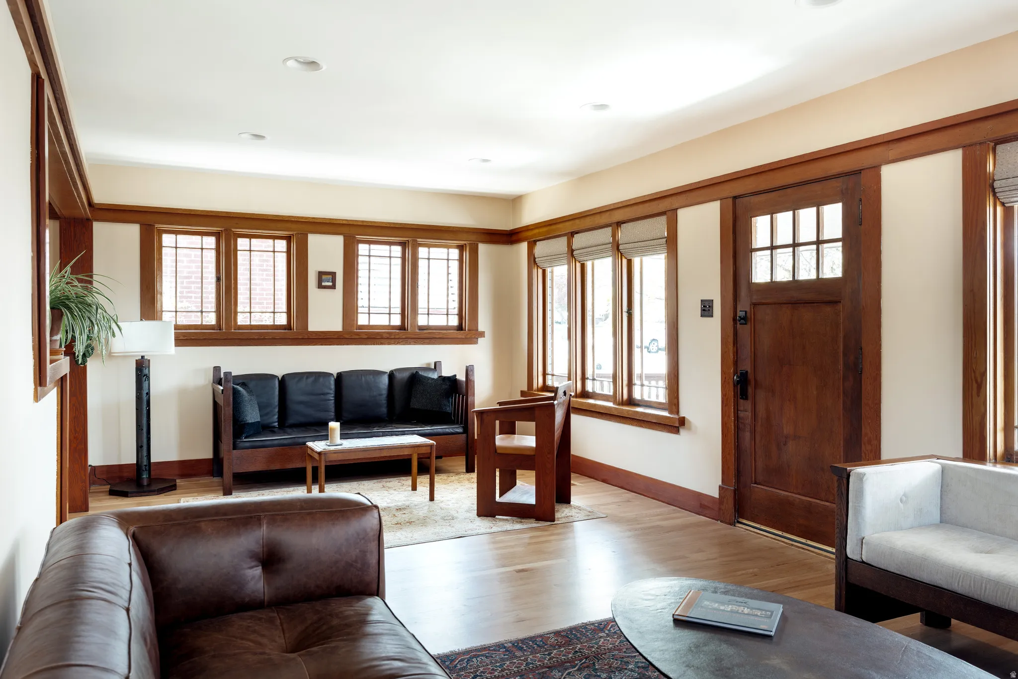 Living room with wood finished floors and baseboards
