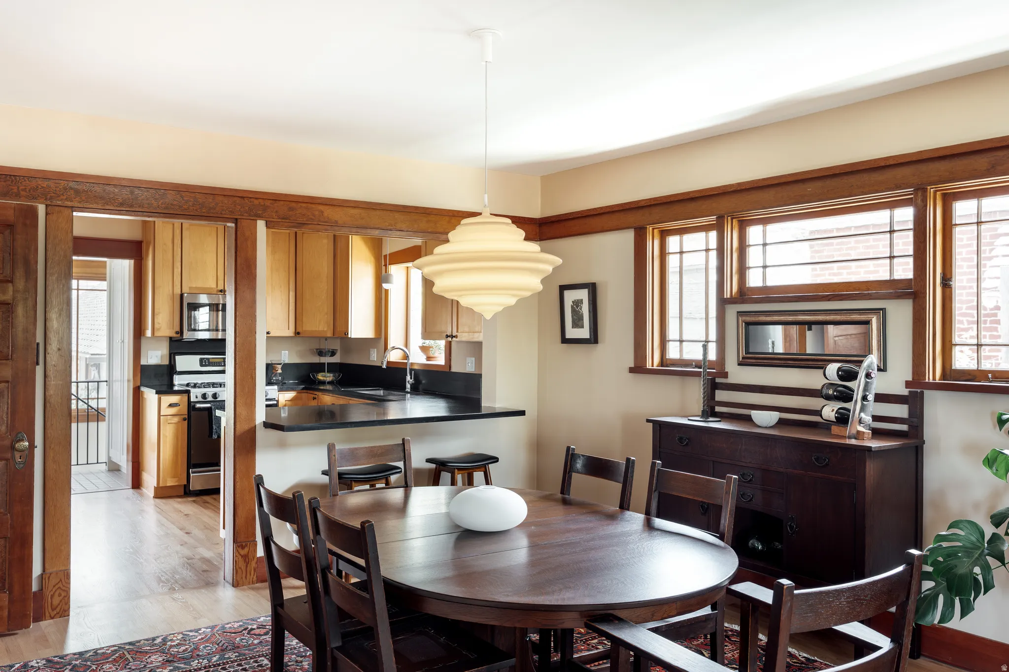 Dining area with light wood finished floors