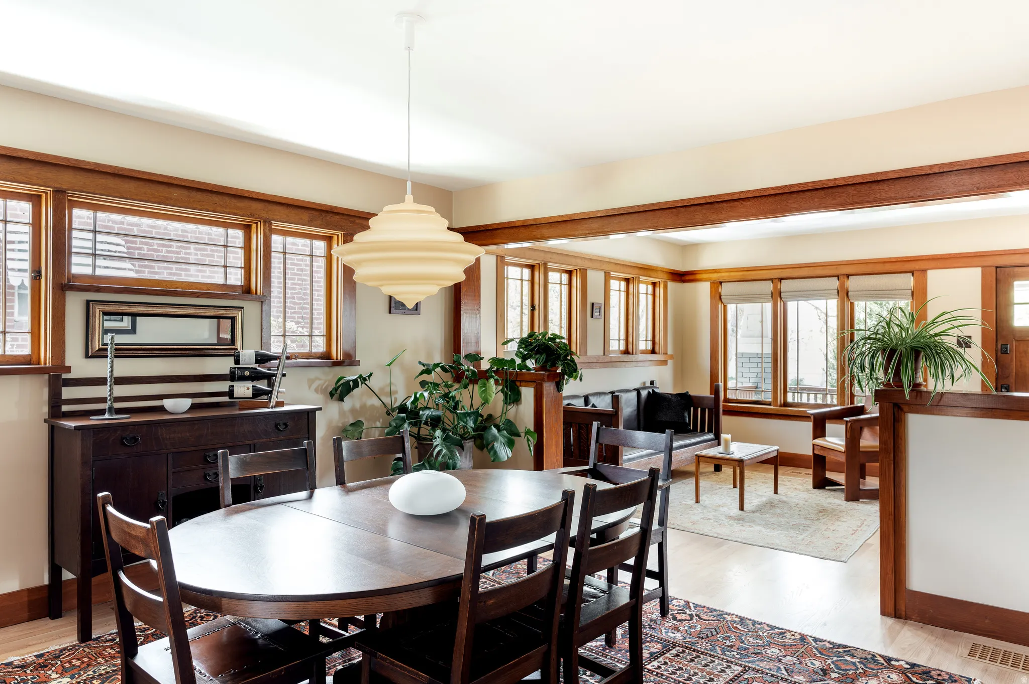 Dining area with light wood-style flooring and plenty of natural light