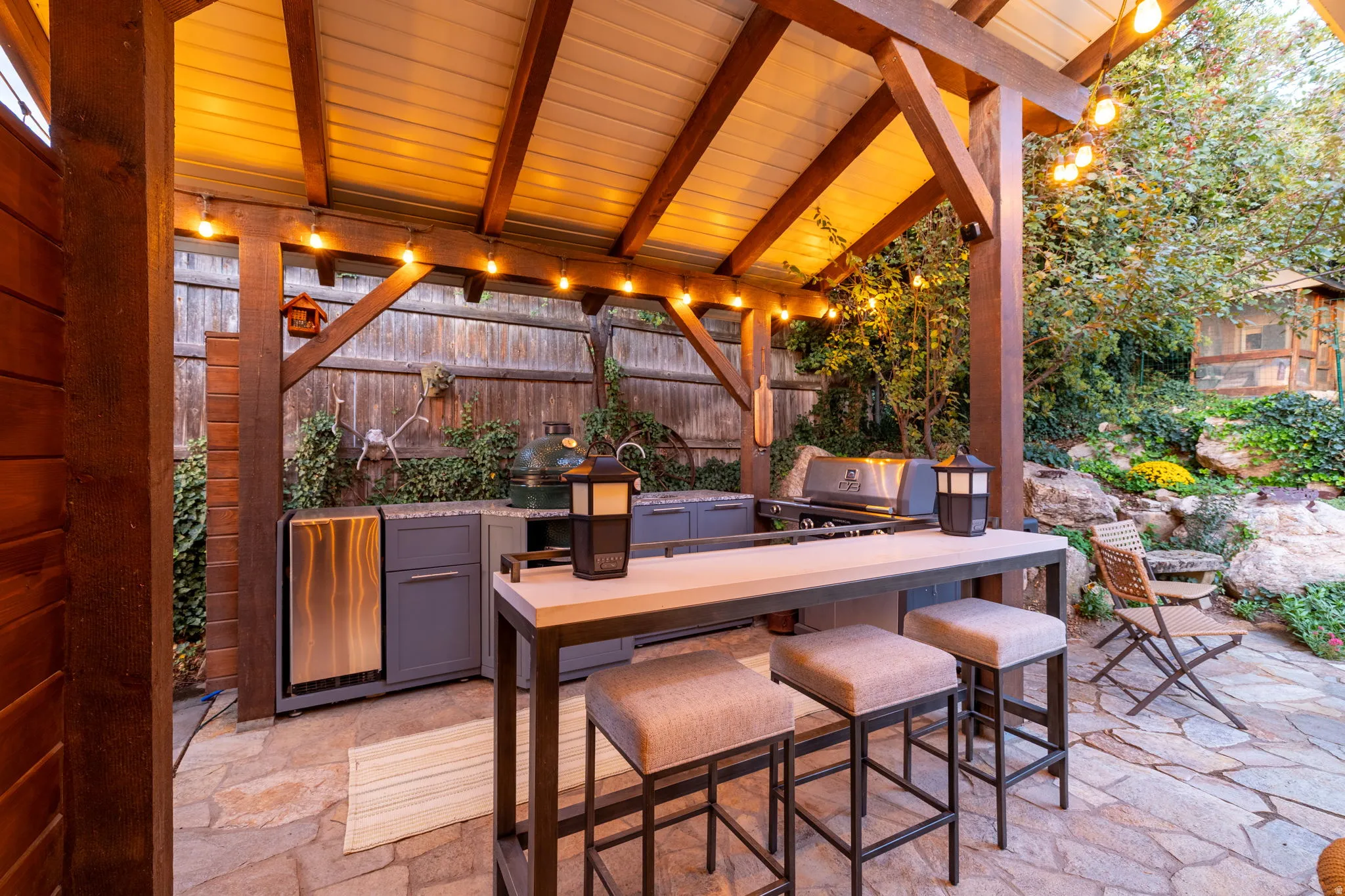 Backyard kitchenette with sink, ice maker and Green Egg cooker