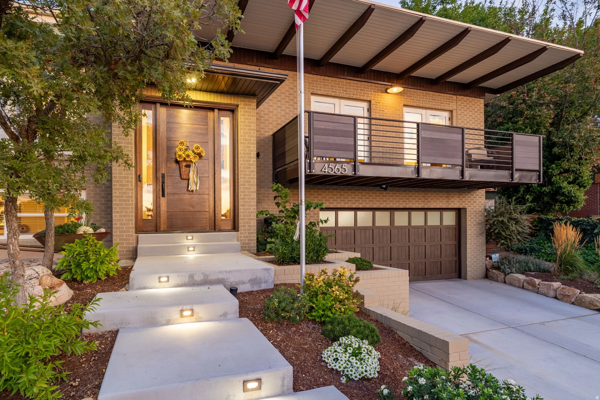 Property entrance balcony, expanded entry and newly completed concrete drive & steps