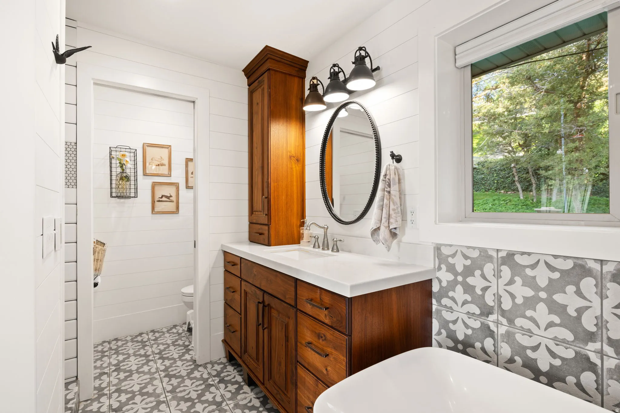 Primary Bathroom with heated floors & in closet washer & dryer