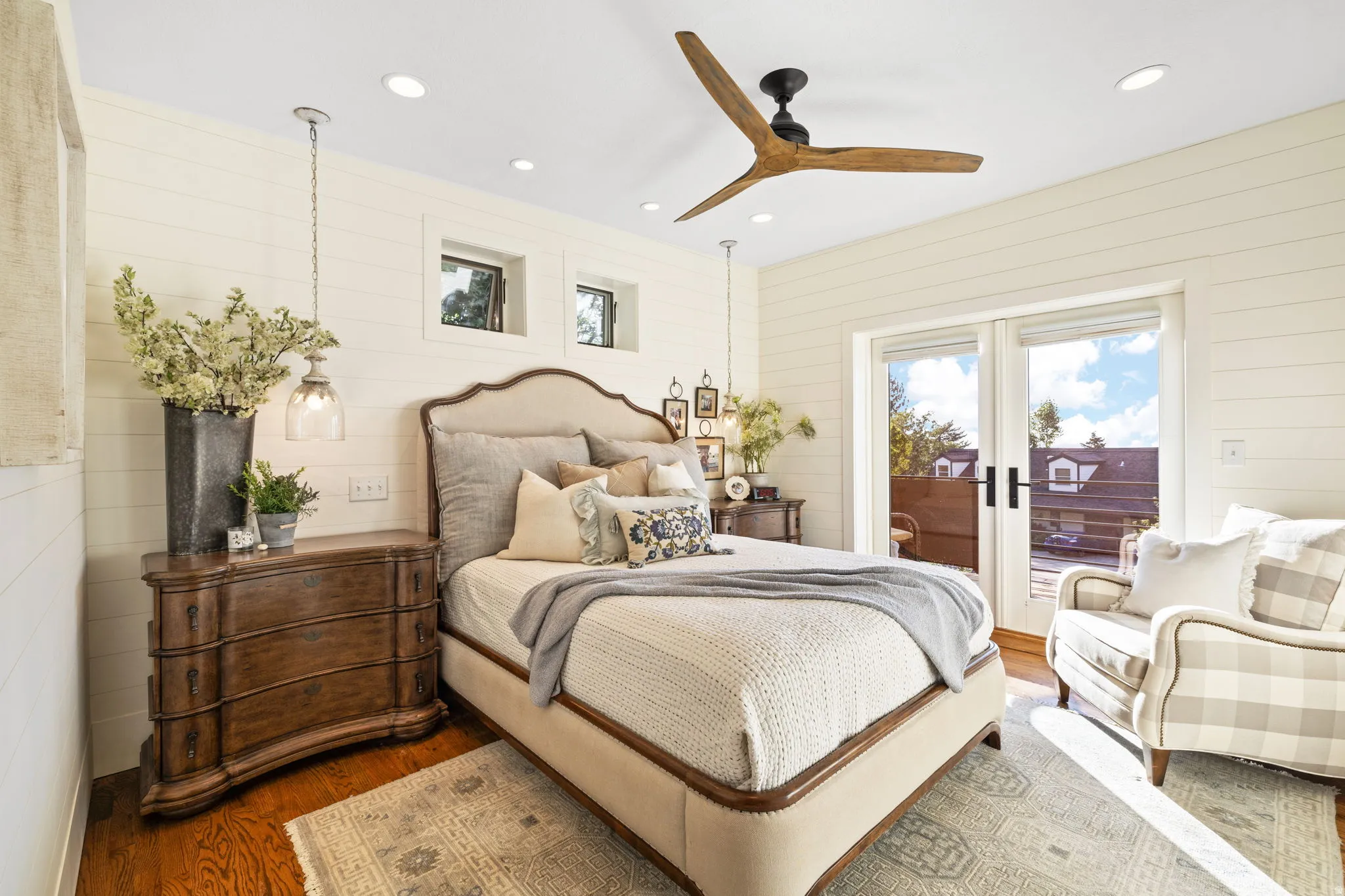 Primary Bedroom with french doors & deck overlooking Salt Lake valley