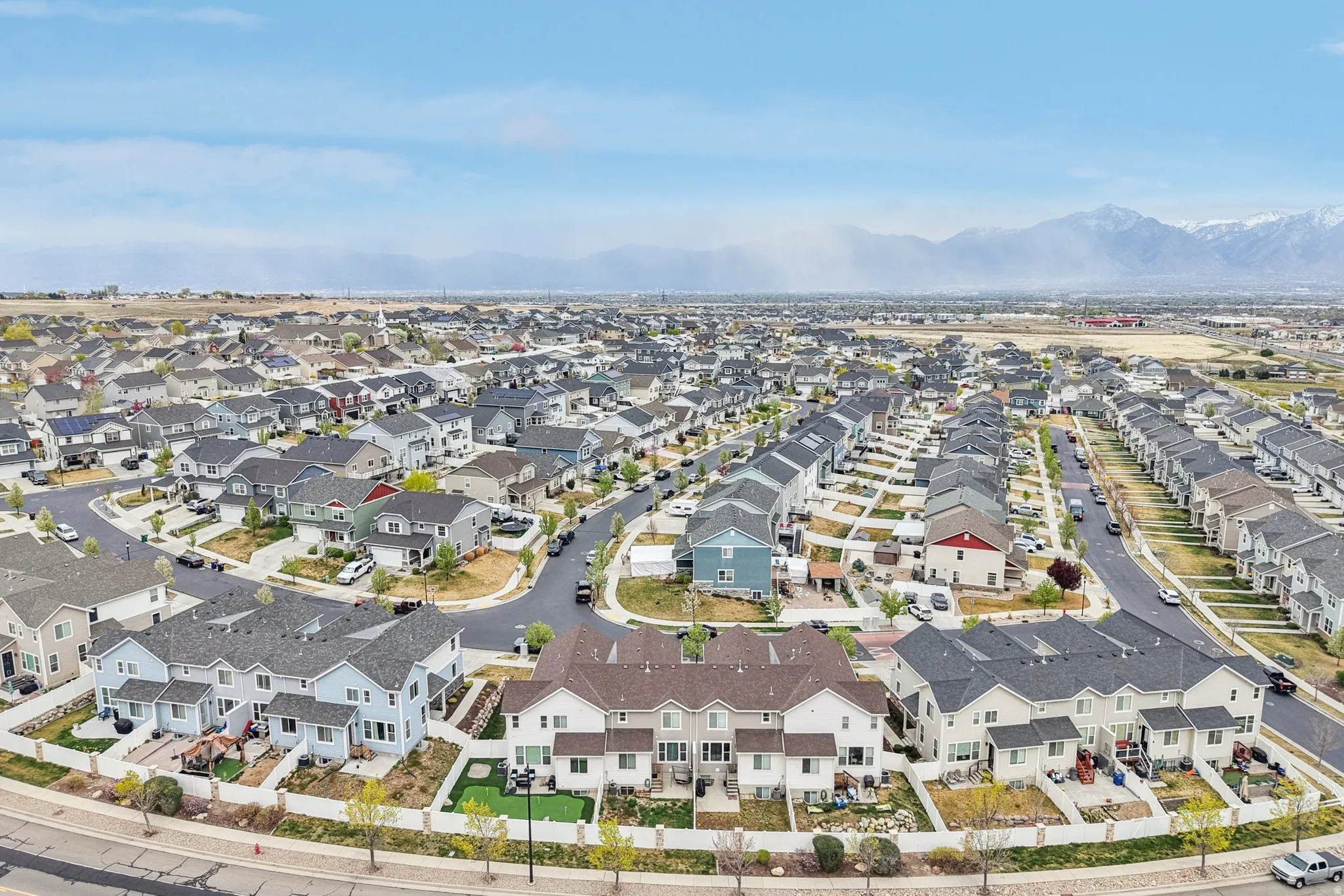 Aerial perspective of suburban area featuring mountains