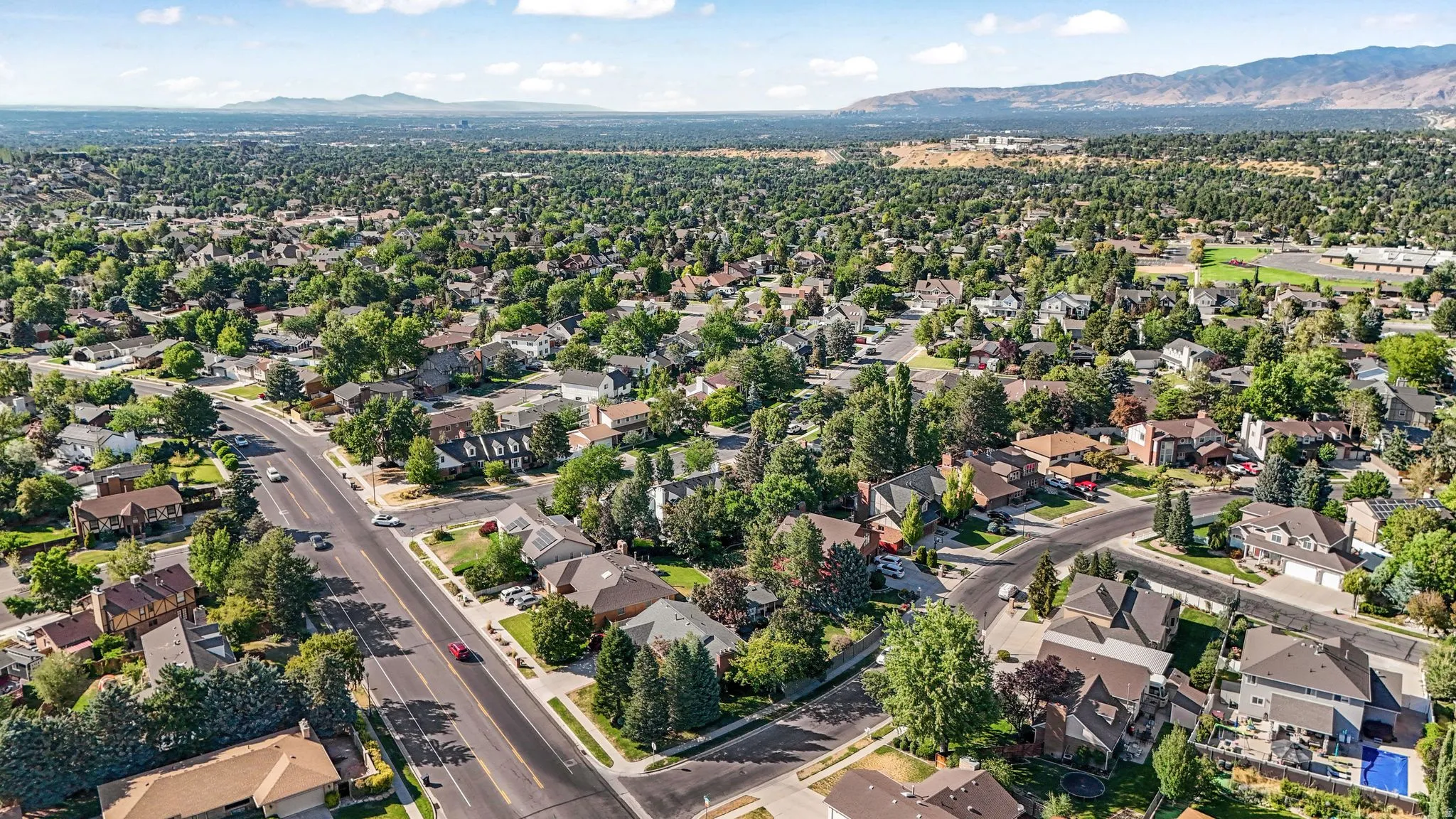 Aerial perspective of suburban area with mountains