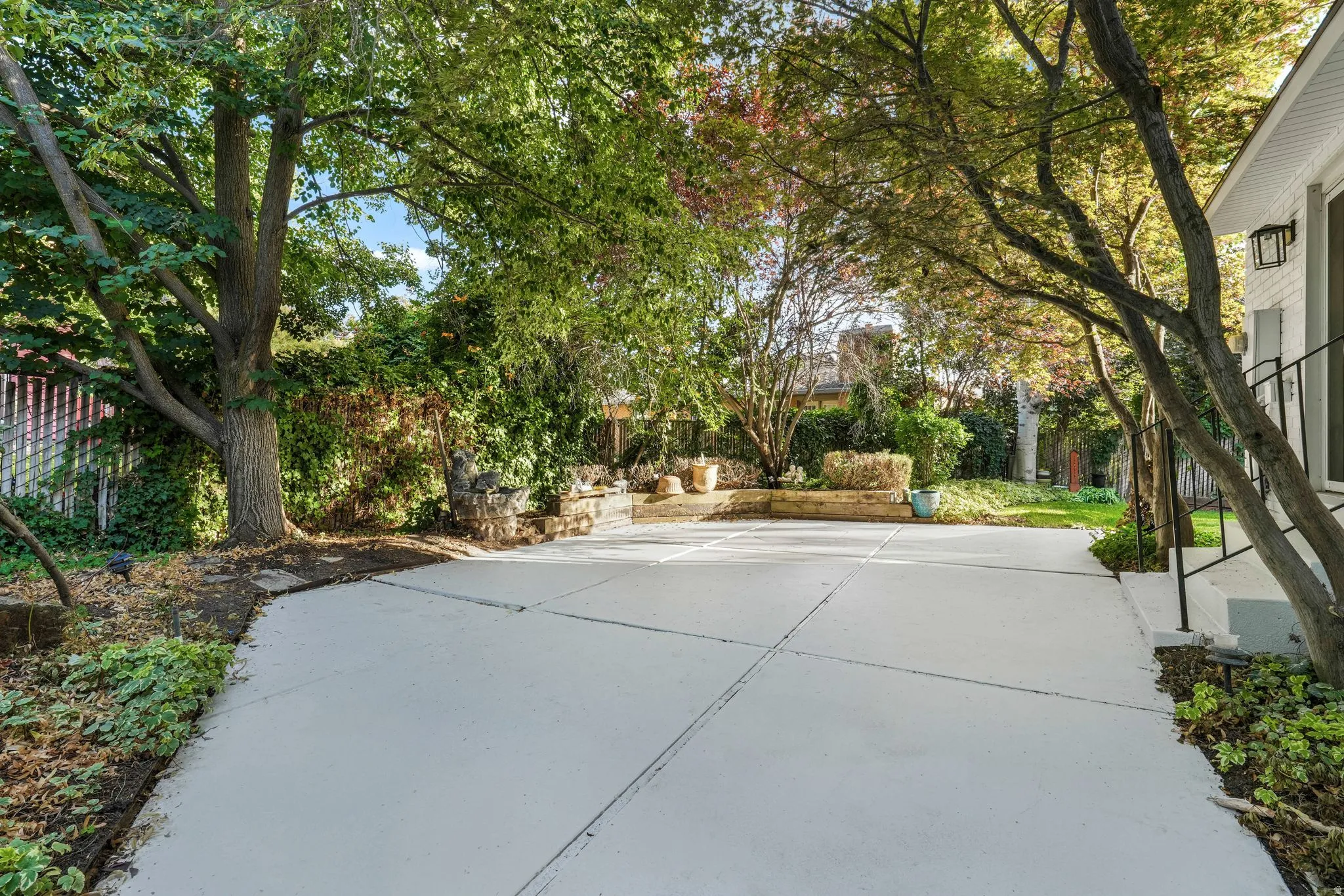 Fenced backyard featuring a patio area