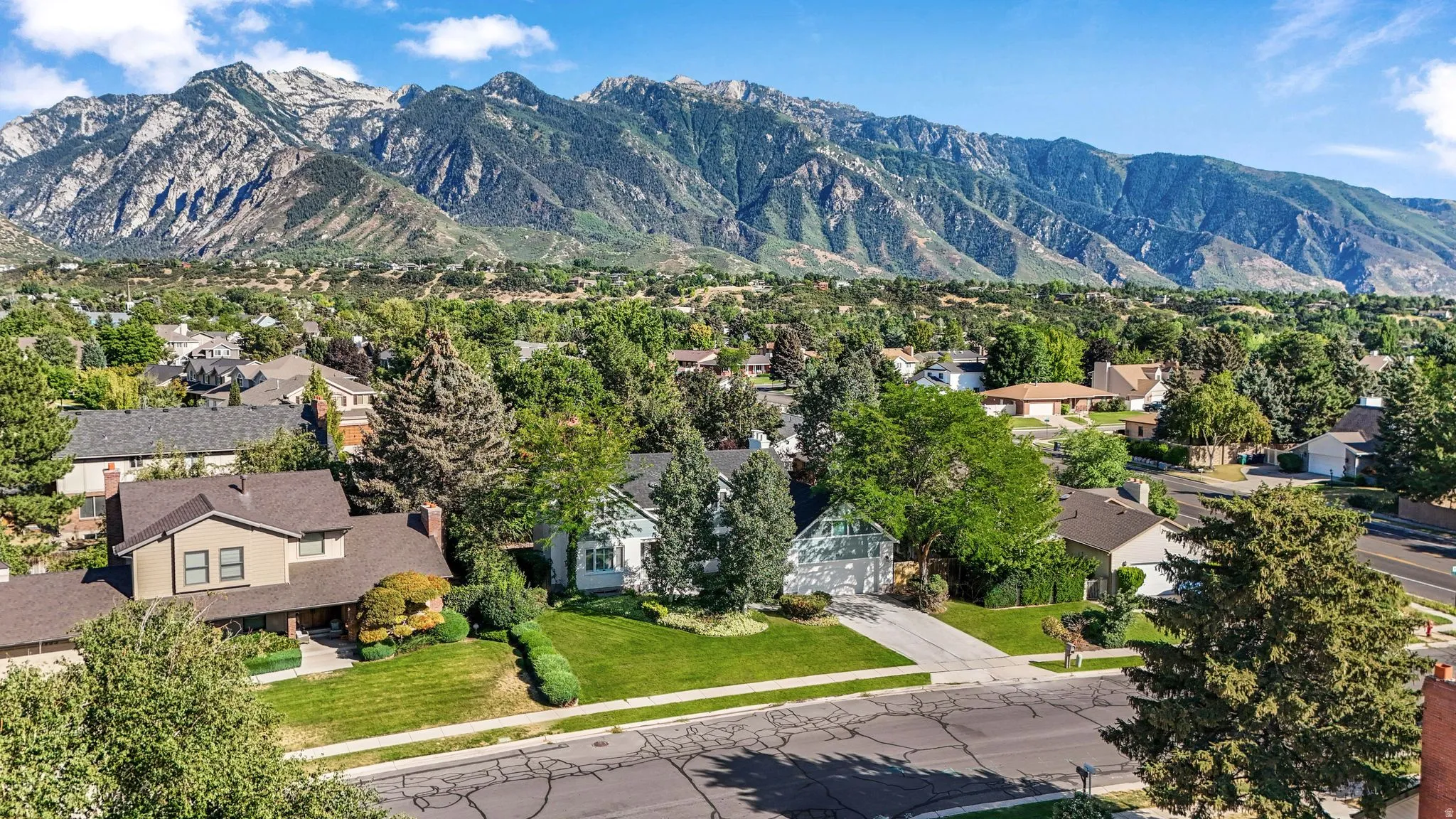 Aerial perspective of suburban area with mountains