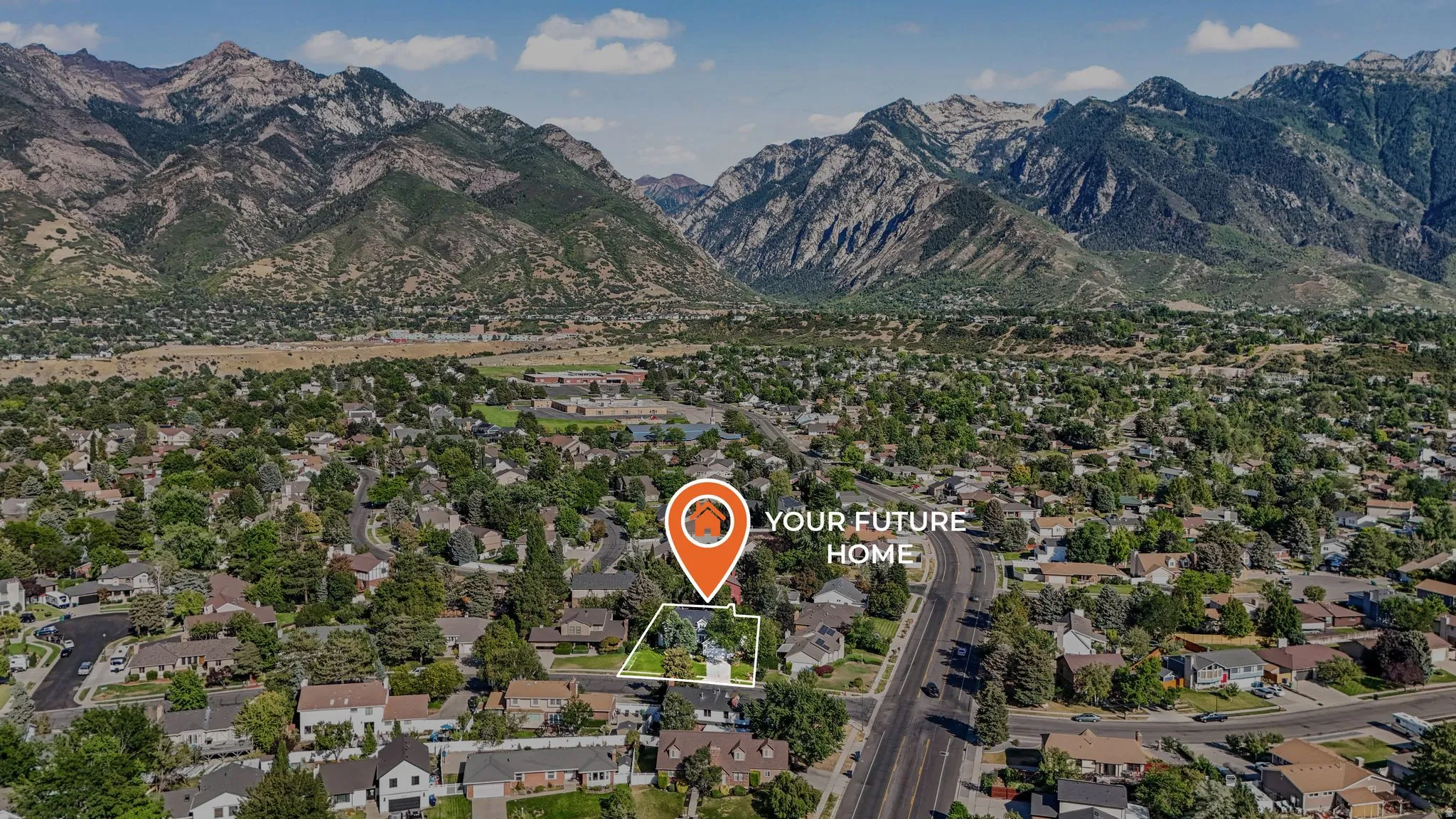 Aerial perspective of suburban area with mountains