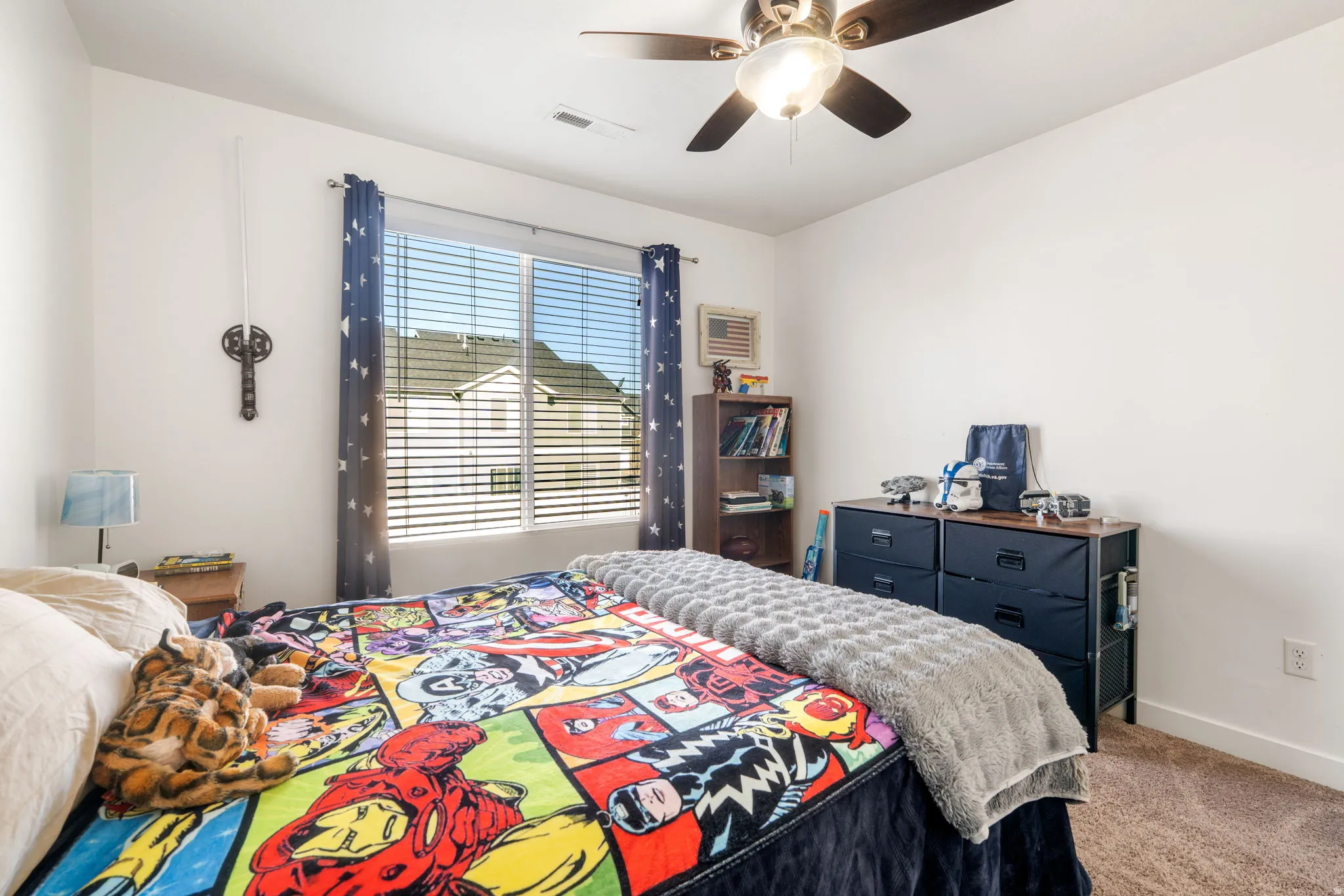 Bedroom featuring carpet flooring and a ceiling fan