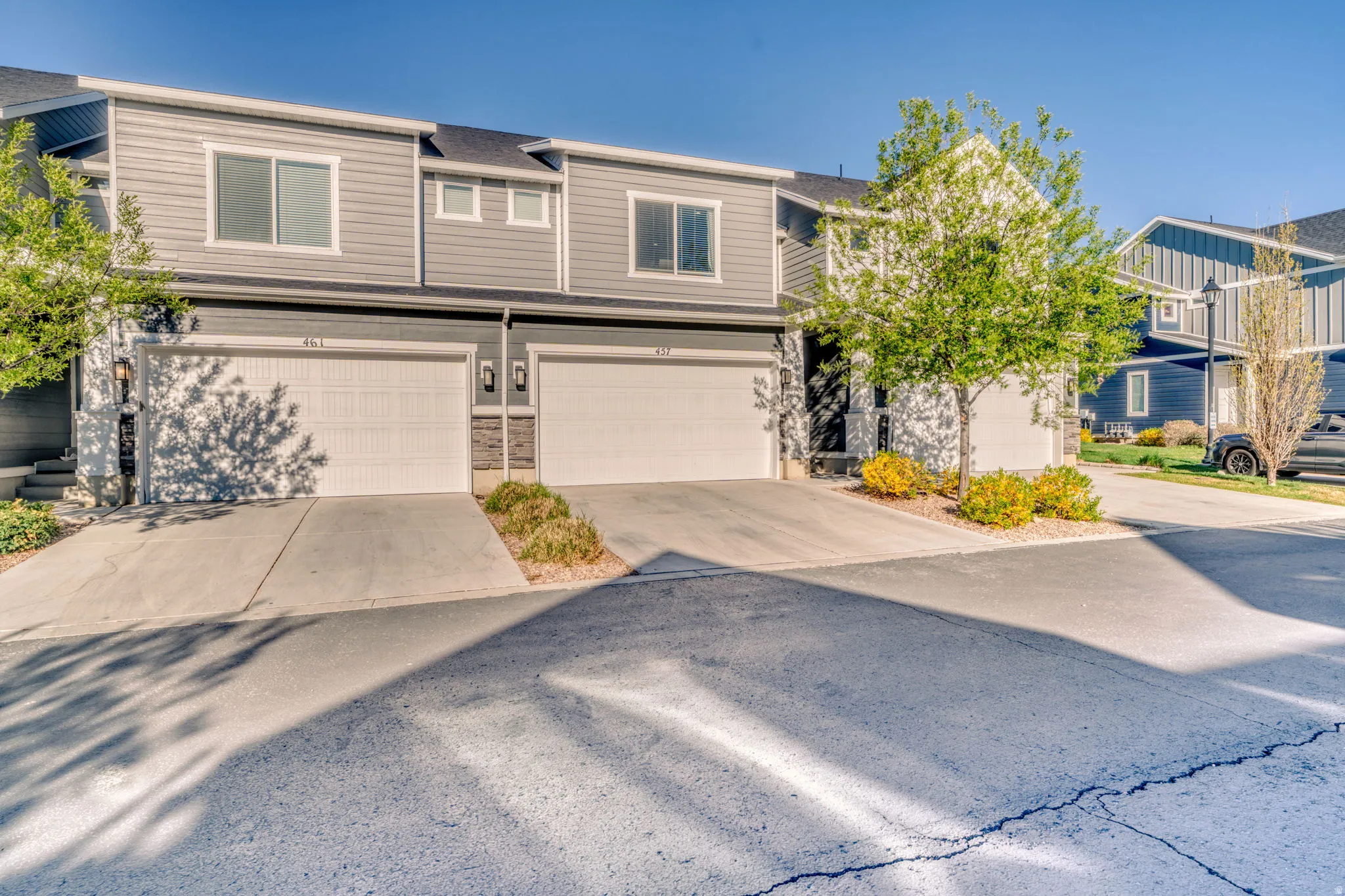 View of front of home featuring driveway and an attached garage