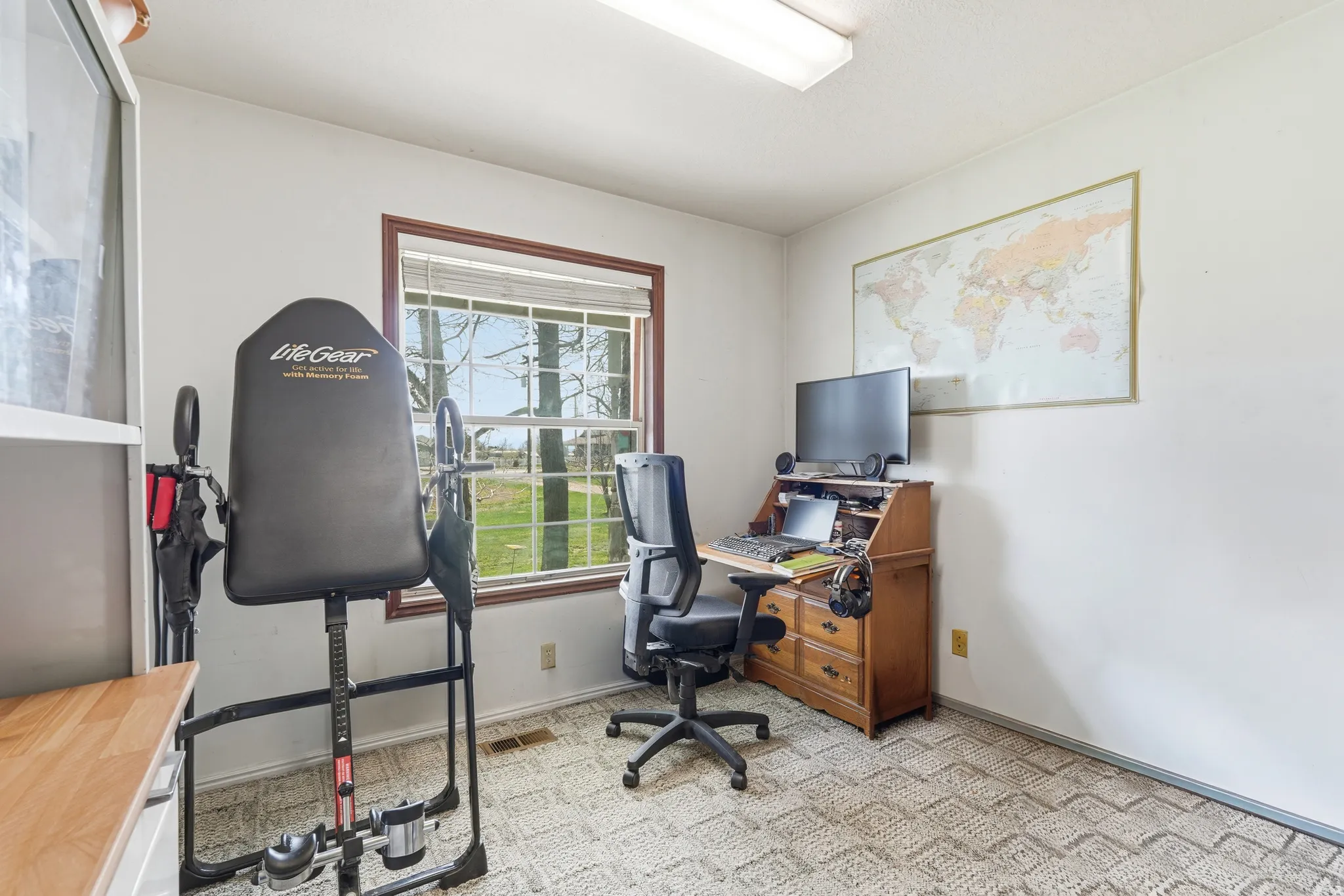 Office area featuring baseboards