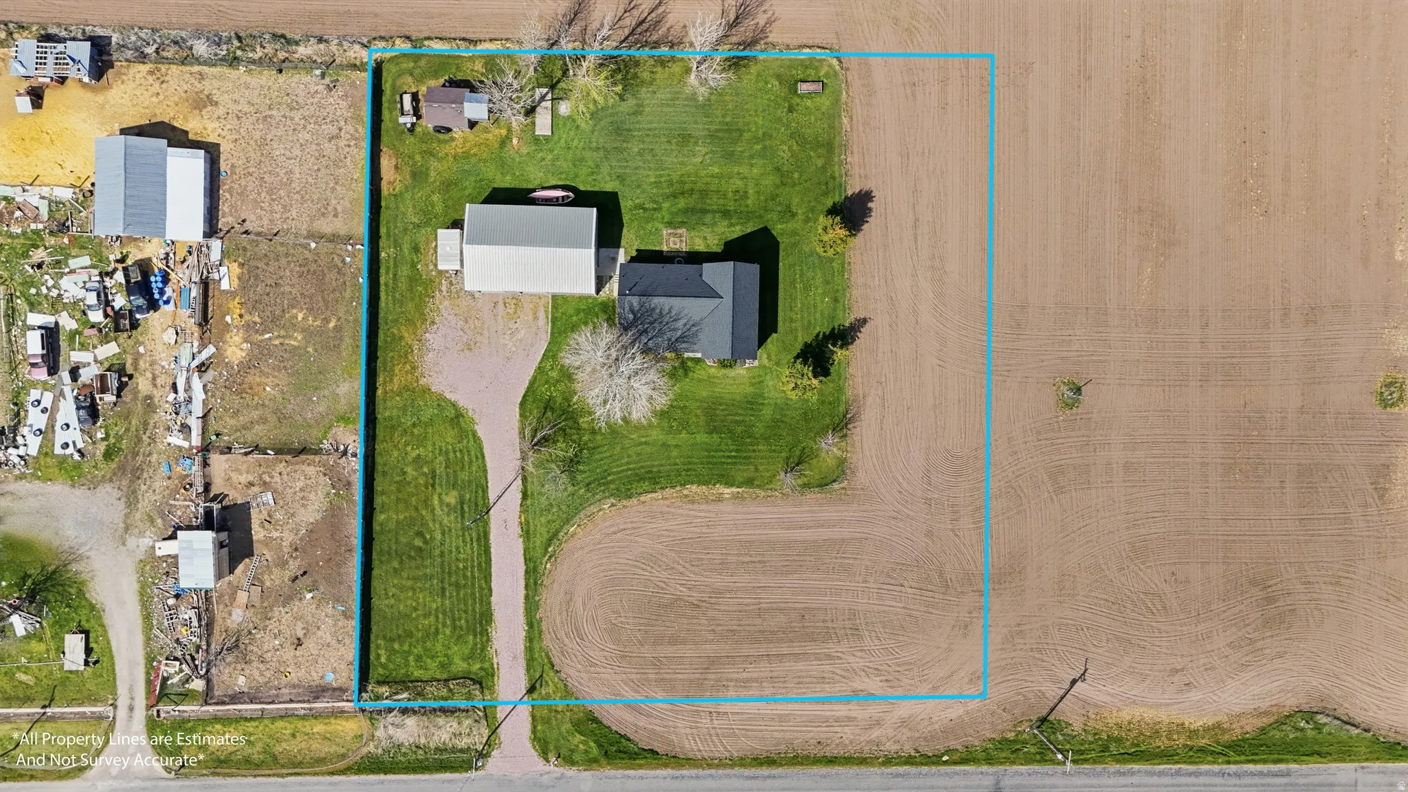 Aerial overview of property's location with property parcel outlined