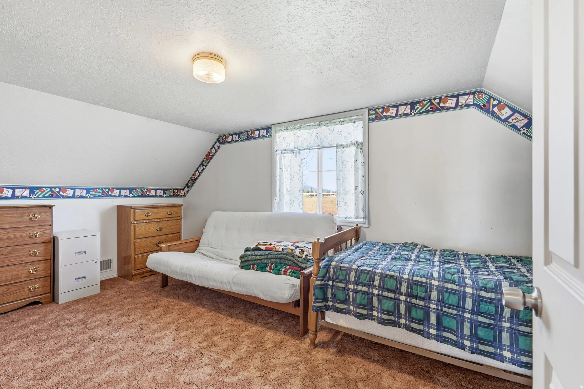 Bedroom featuring carpet