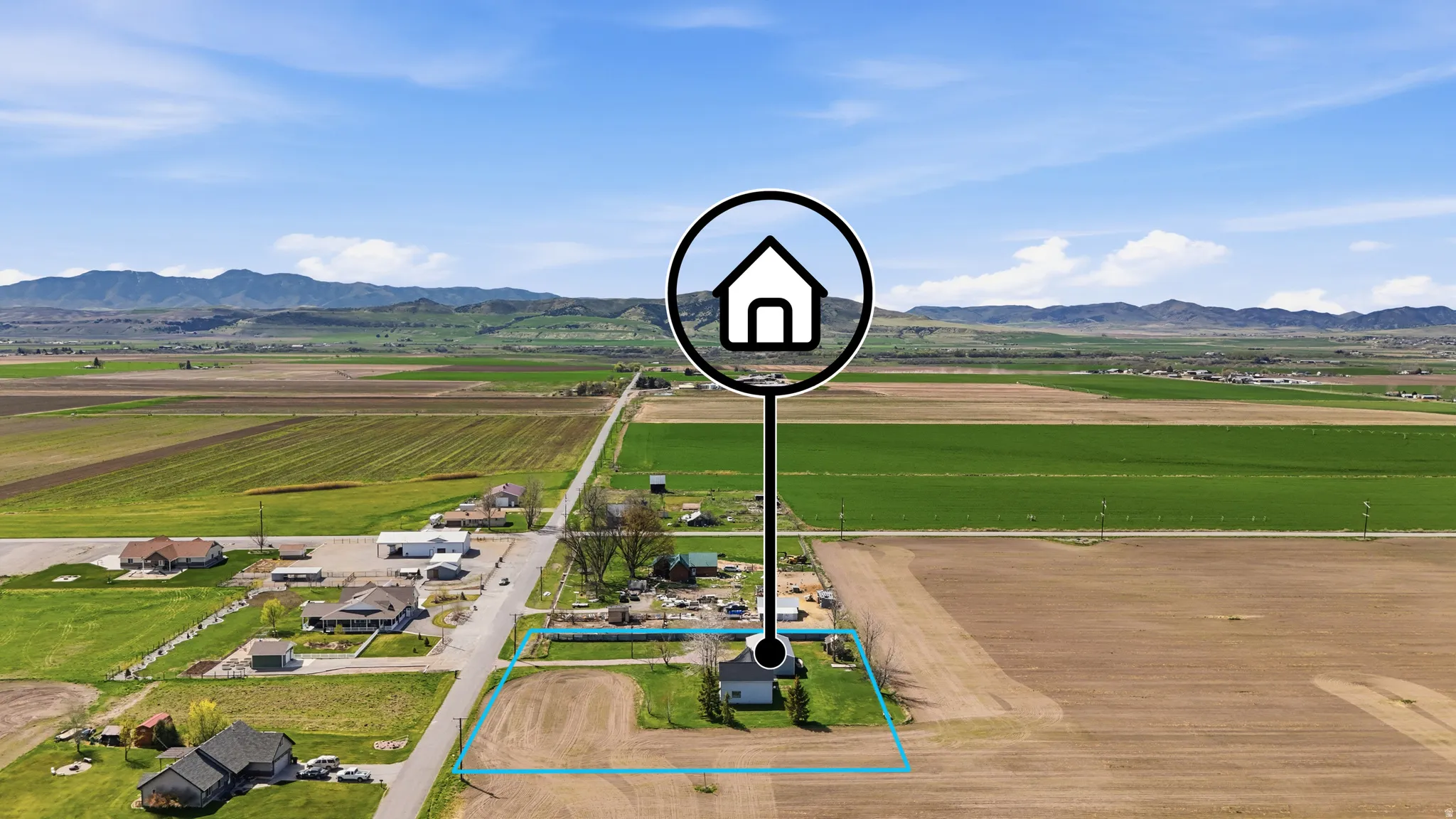 View of rural area with property parcel outlined and a mountain backdrop