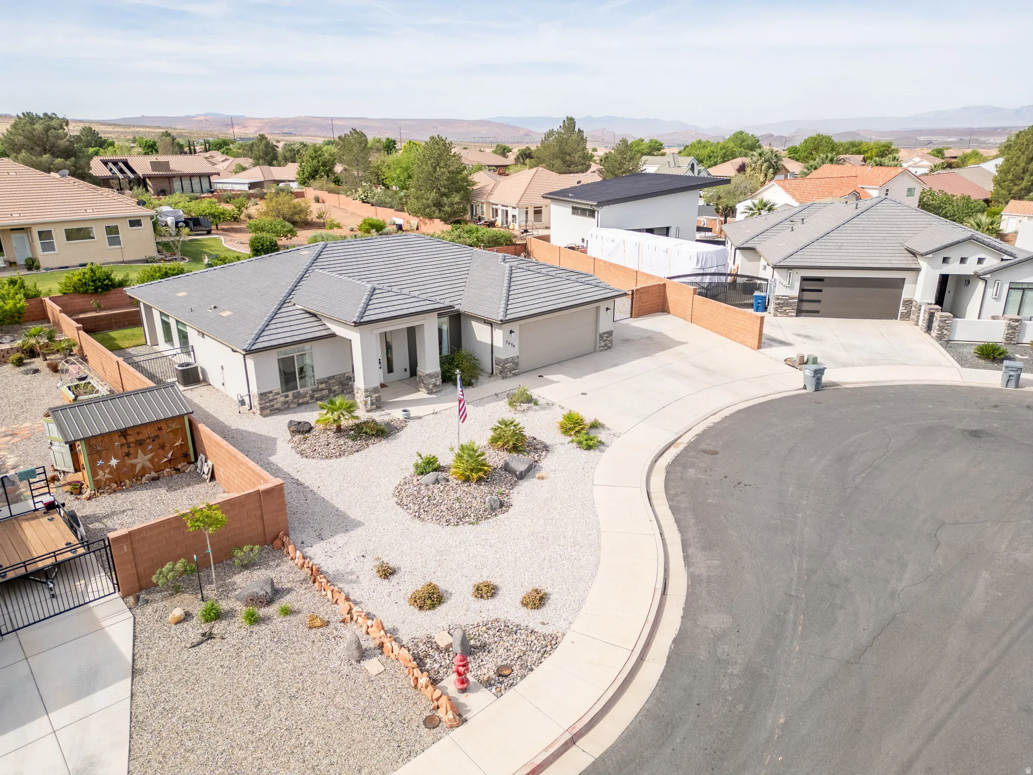 Aerial view of residential area with mountains