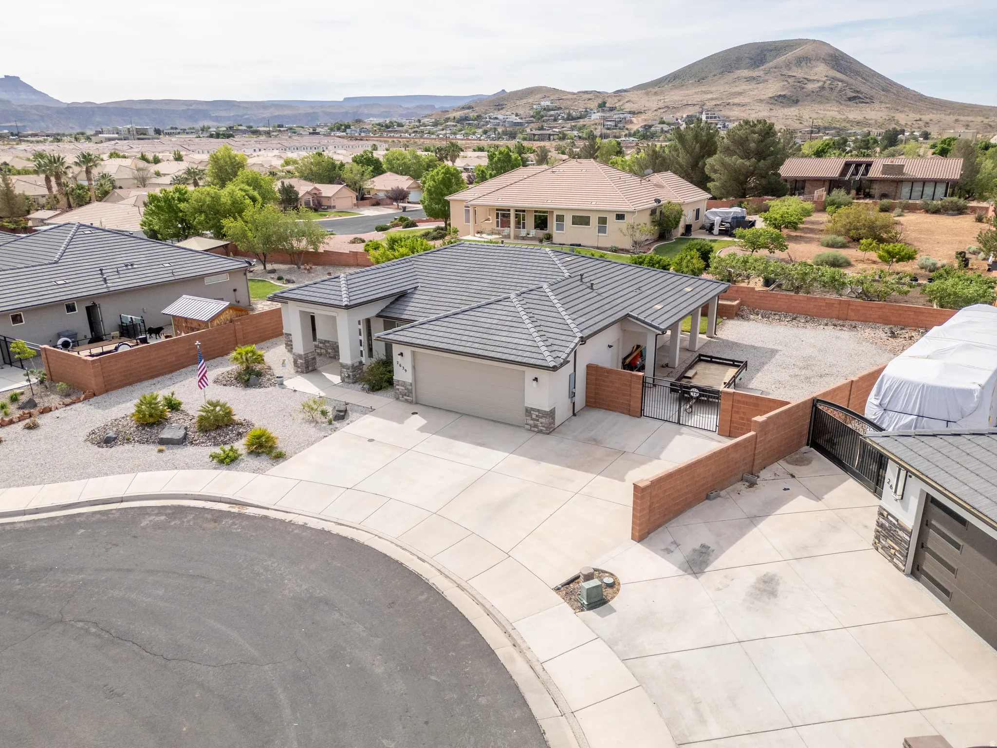 Aerial view of residential area with a mountain backdrop