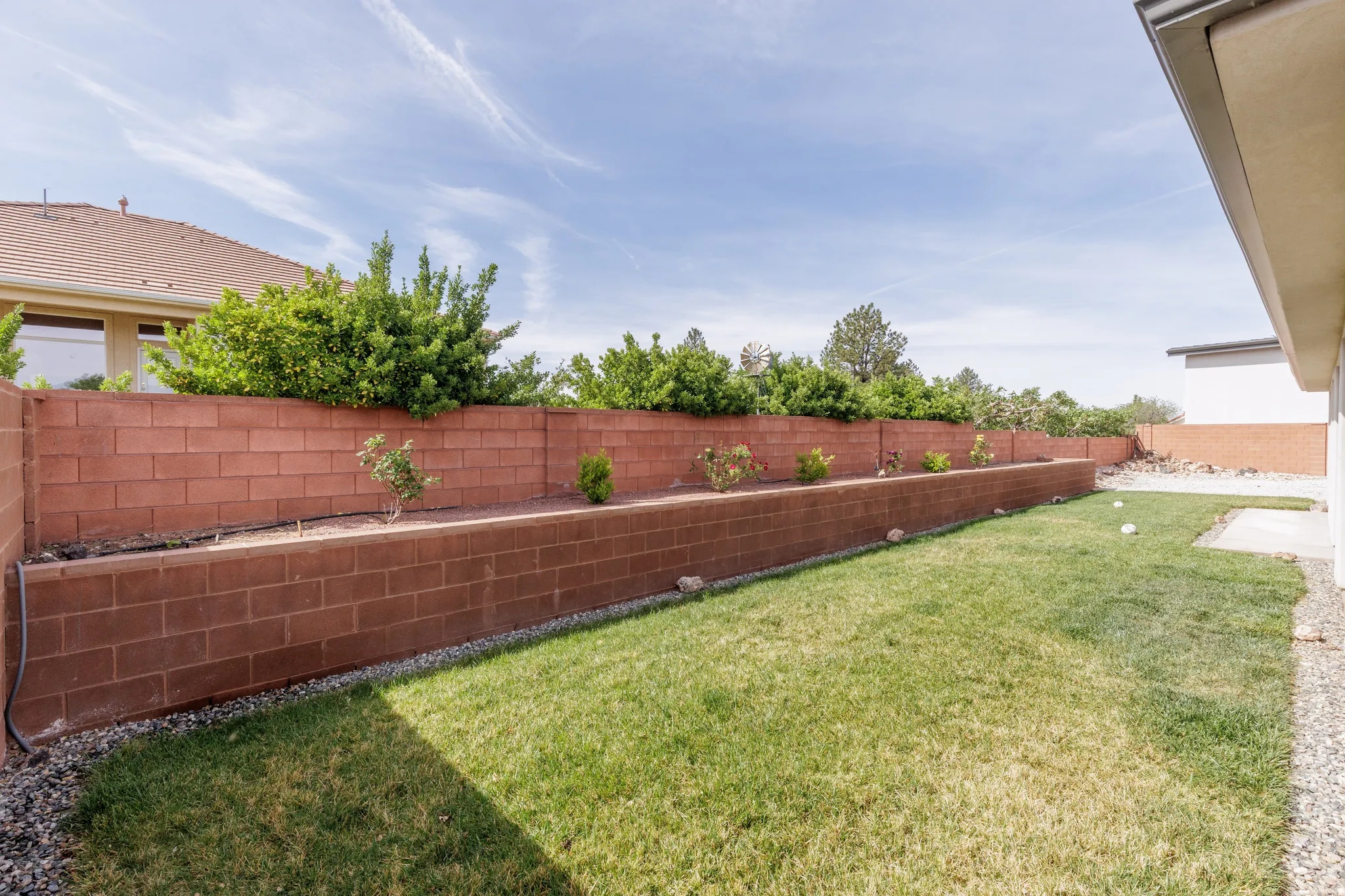 View of fenced backyard