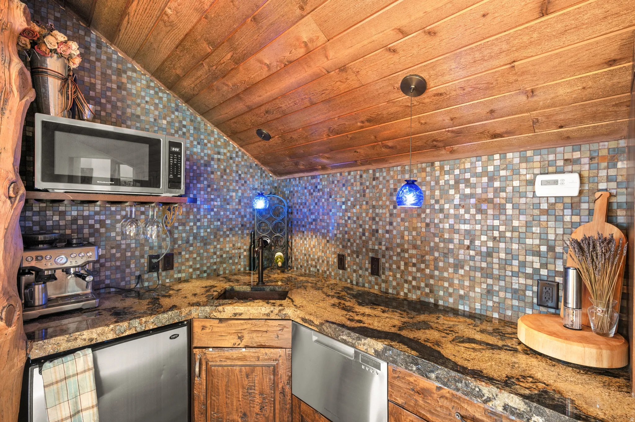 second floor wet bar and kitchen next to open space
