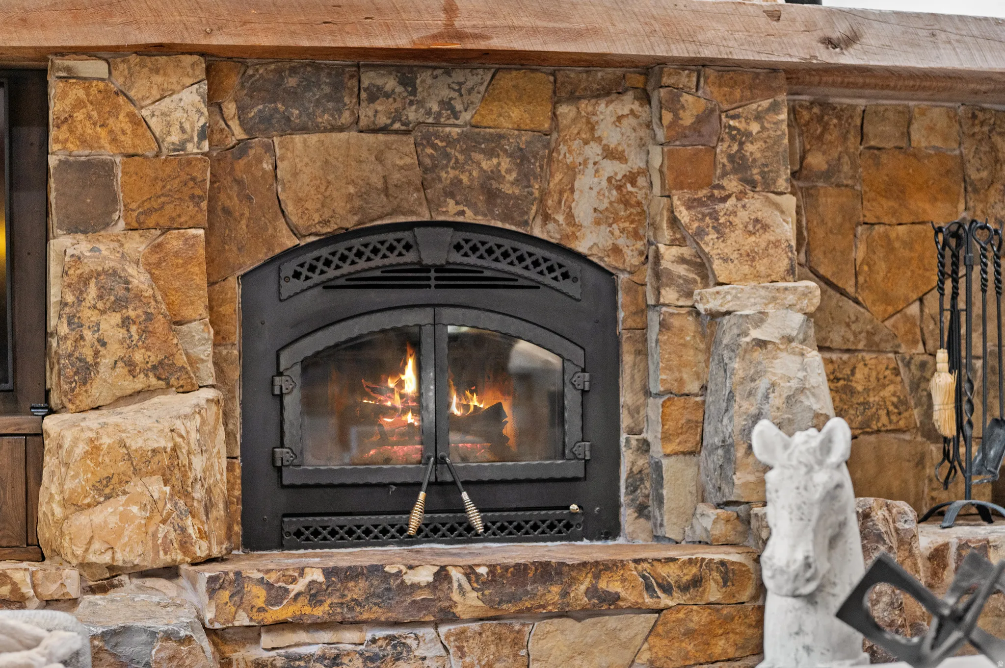 Detailed view of a glass covered fireplace