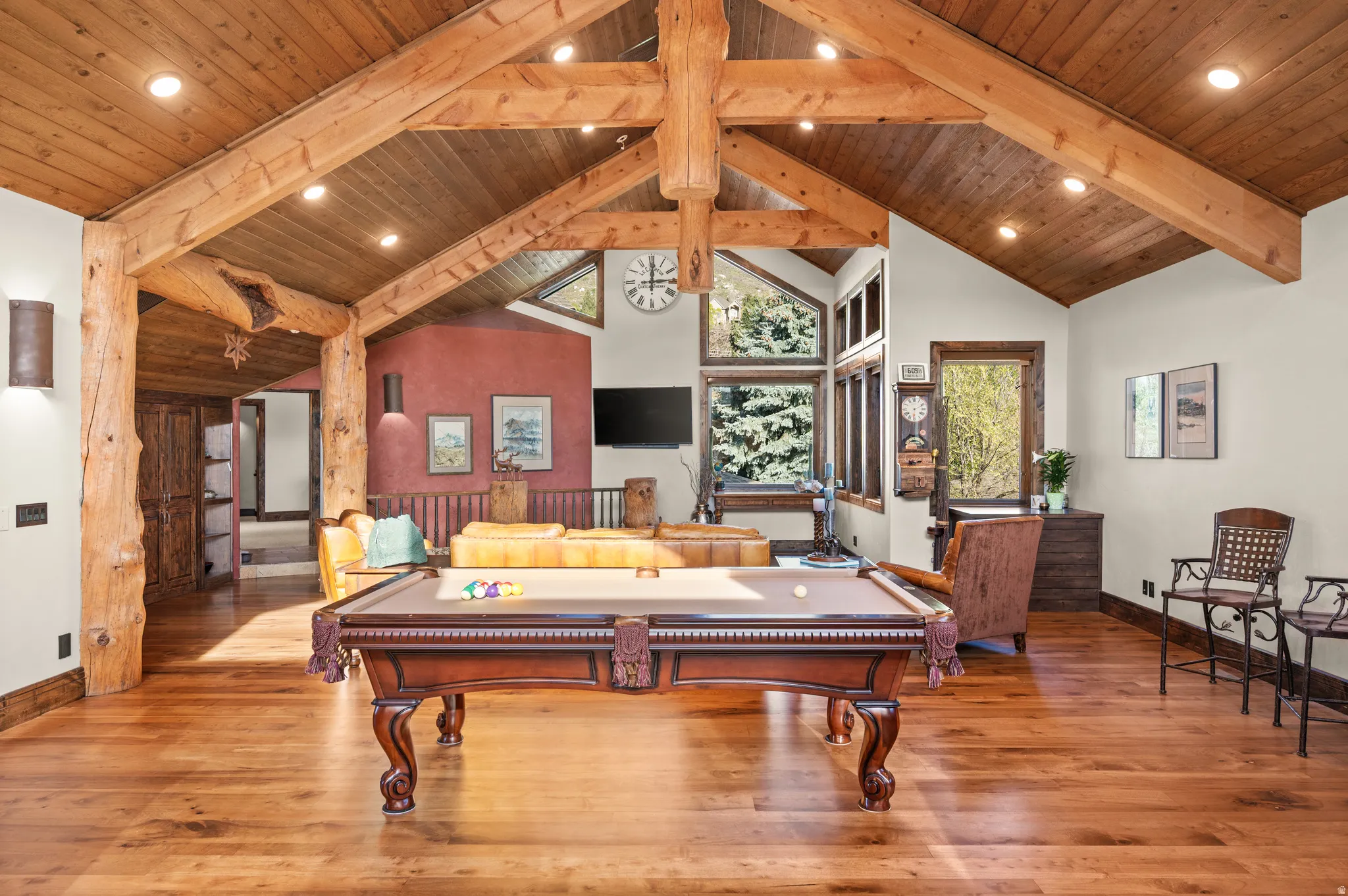Game room with a high wood beamed ceiling, hardwood / wood-style flooring, recessed lighting, and billiards