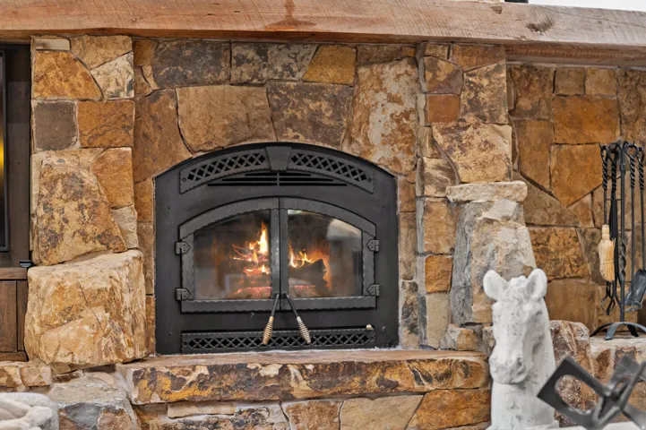 Detailed view of a glass covered fireplace
